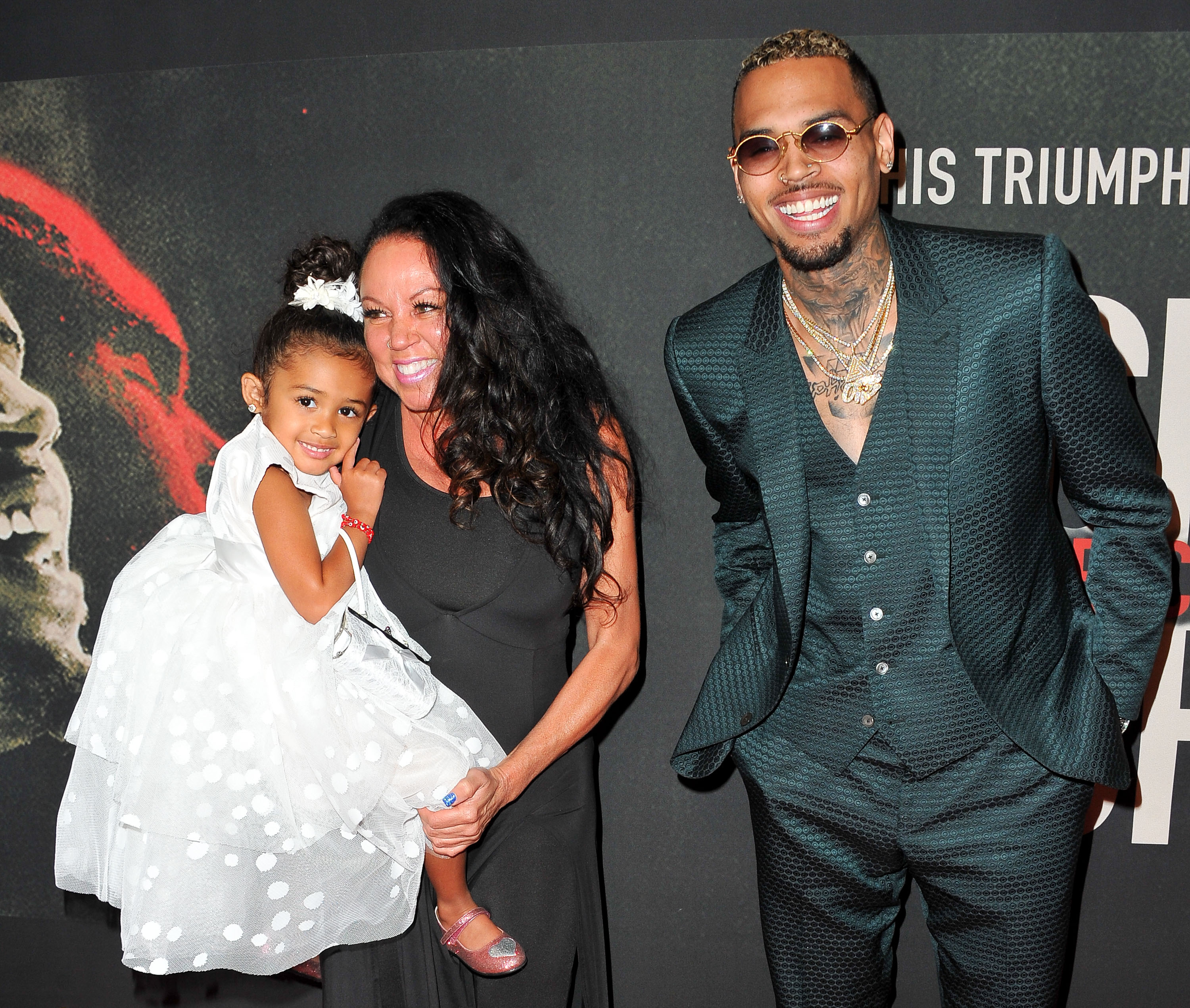 Joyce Hawkins, Chris brown and his daughter Royalty Brown at the premiere of "Chris Brown: Welcome To My Life" on June 6, 2017, in Los Angeles, California. | Source: Getty Images