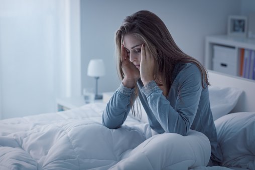 Femme dépressive réveillée. | Photo : Getty Images