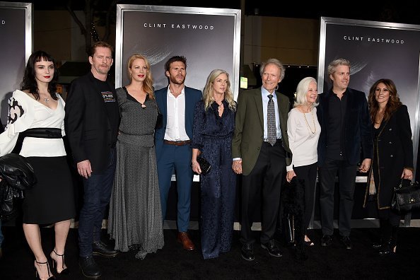 Graylen Eastwood, Stacy Poitras, Alison Eastwood, Scott Eastwood, Christina Sandera, Clint Eastwood, Maggie Johnson, Kyle Eastwood and Cynthia Ramirez at the Village Theatre on December 10, 2018 in Los Angeles, California. | Photo: Getty Images