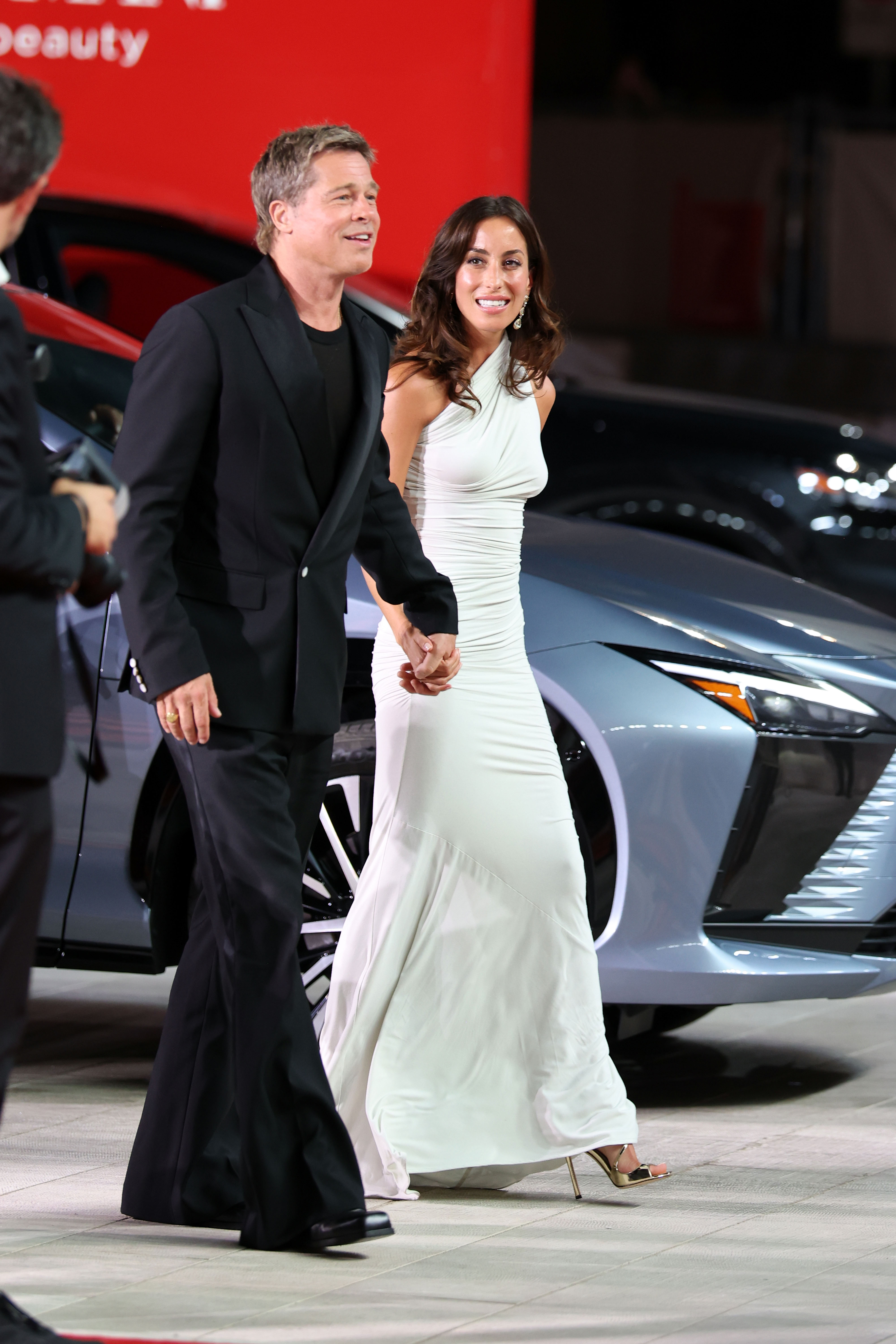 Brad Pitt and Ines de Ramon at the premiere of "Wolfs" during the 81st Venice International Film Festival in Venice, Italy on September 1, 2024 | Source: Getty Images