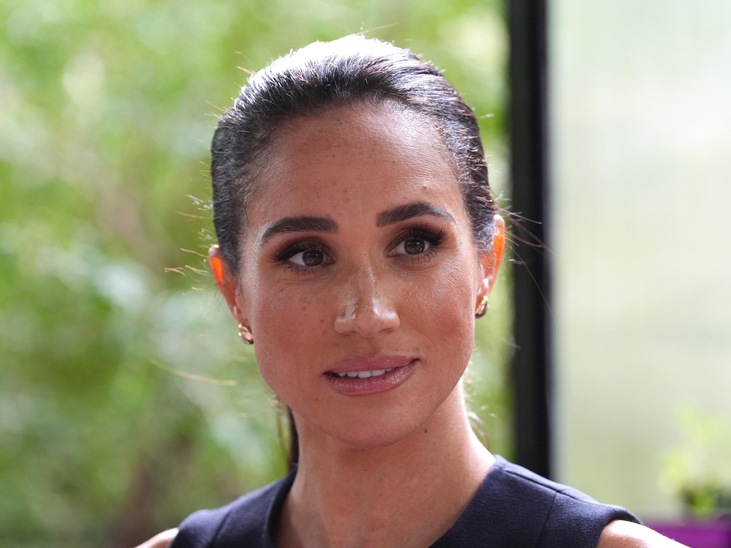 Meghan, Duchess of Sussex takes part in a therapy session in the Kelpie garden with adolescent patients on a visit to the Royal Children's Hospital with her husband Prince Harry, Duke of Sussex on April 14, 2026 in Melbourne, Australia. | Source: Getty Images