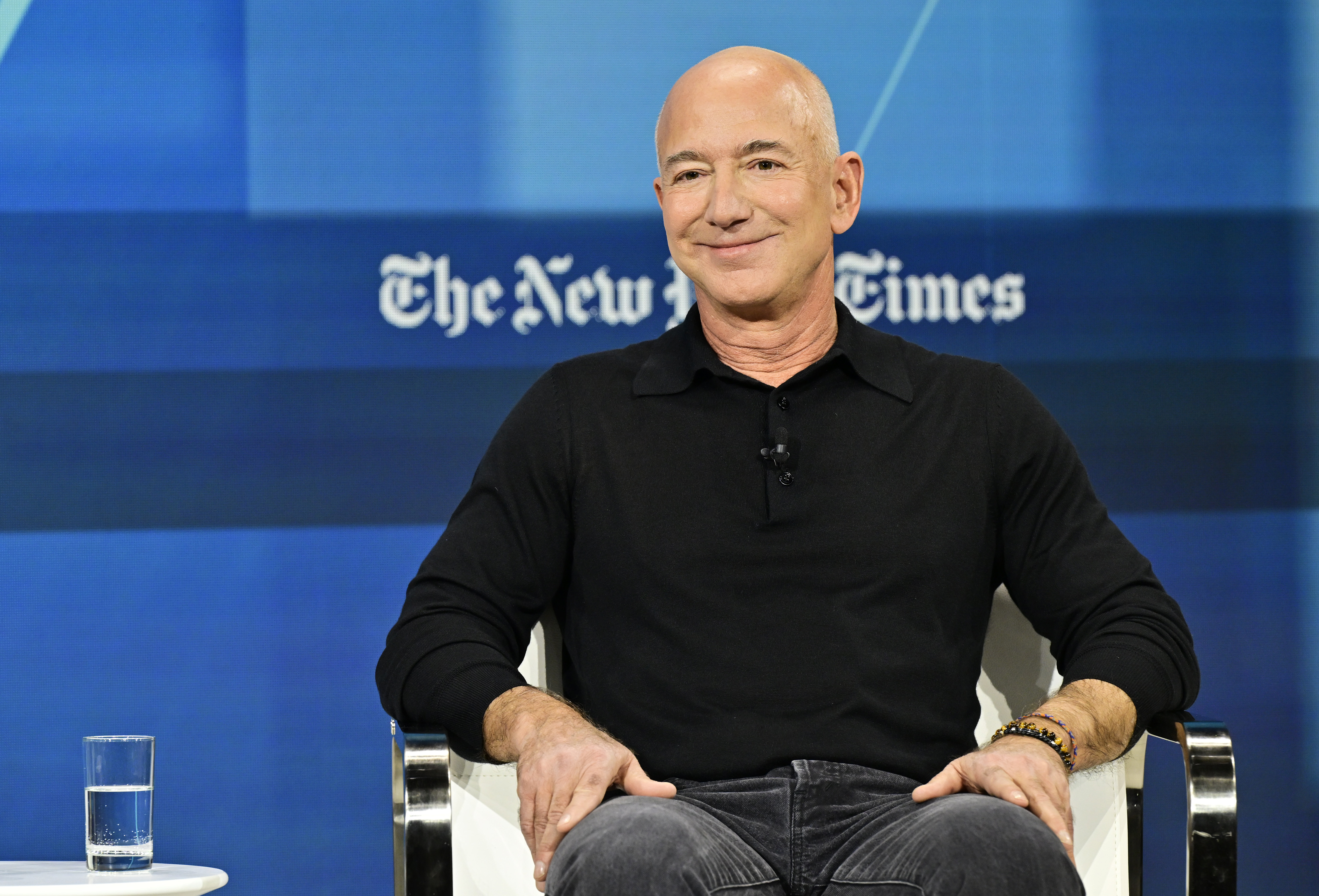 Jeff Bezos speaks onstage during The New York Times Dealbook Summit on December 4, 2024, in New York City. | Source: Getty Images