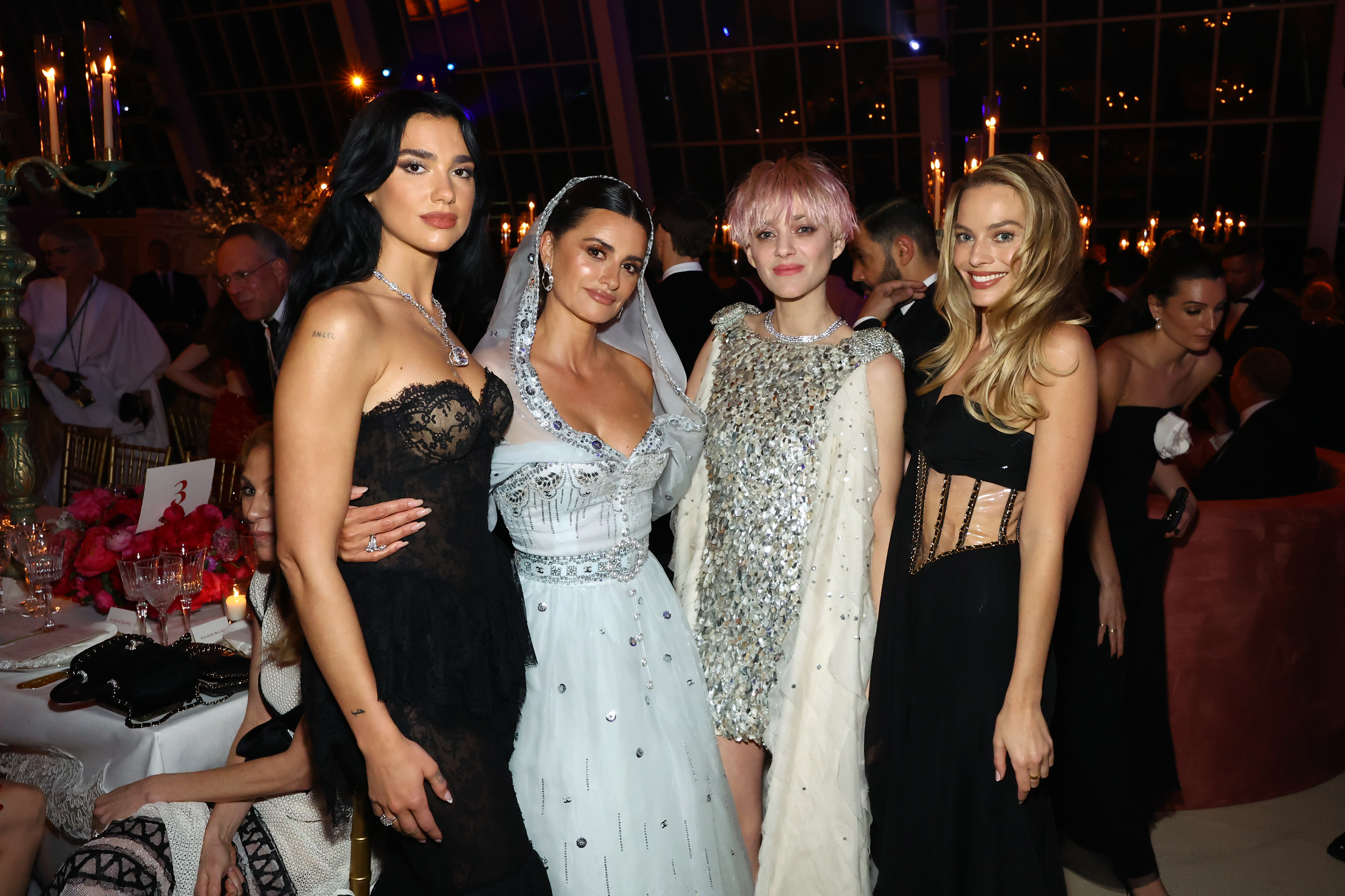 Dua Lipa, Penélope Cruz, Marion Cotillard, and Margot Robbie attend The Met Gala Celebrating "Karl Lagerfeld: A Line Of Beauty" at The Metropolitan Museum of Art in New York City, on May 1, 2023. | Source: Getty Images