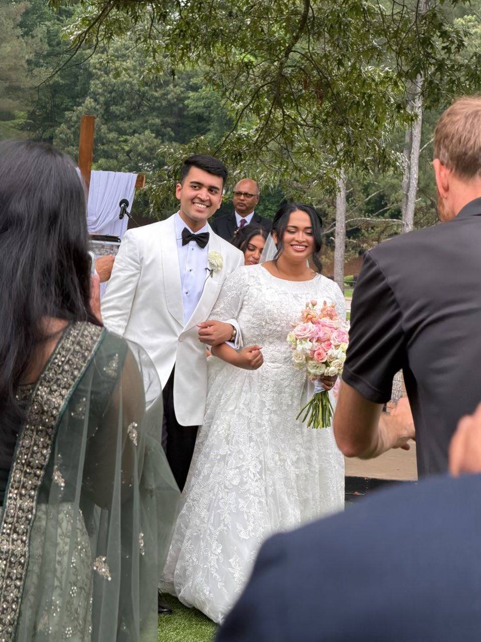 Dave and Jesni Fiji is seen on their wedding day in a post dated May 31, 2026 | Source: Facebook/jaison.mathew57