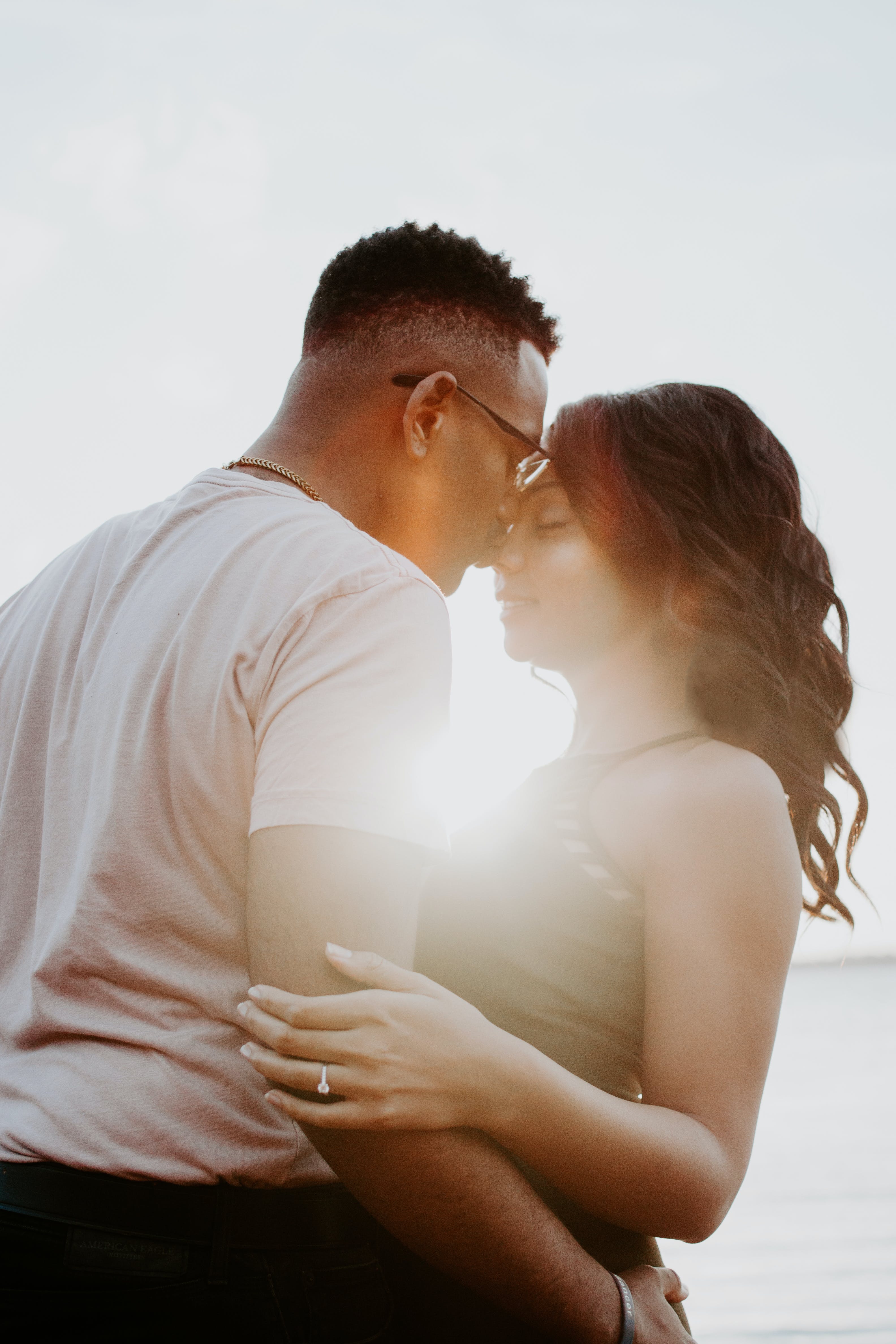 A married couple lovingly embracing while outside | Source: Pexels