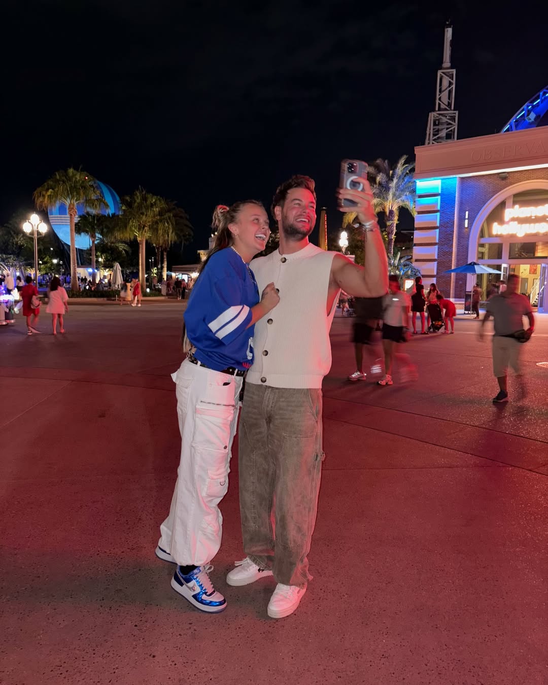 JoJo Siwa and Chris Hughes during their vacation from a post dated May 20, 2025 | Source: Instagram/chrishughesofficial