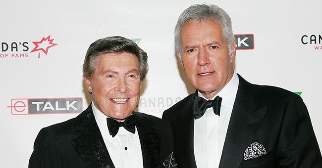 Johnny Gilbert and Alex Trebek attend Canada's Walk Of Fame Gala sponsored by Chanel at the HummingBird Centre June 3, 2006 in Toronto, Canada | Photo: Getty Images