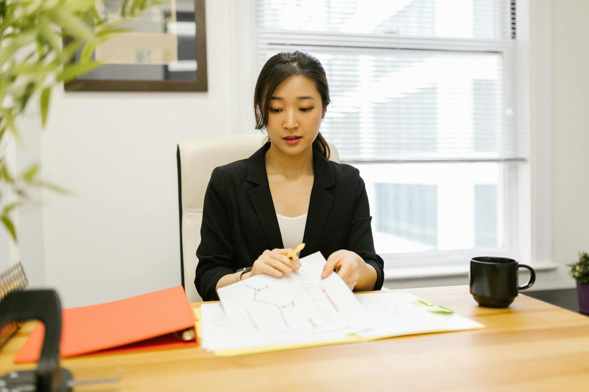 A woman at her workplace | Source: Pexels