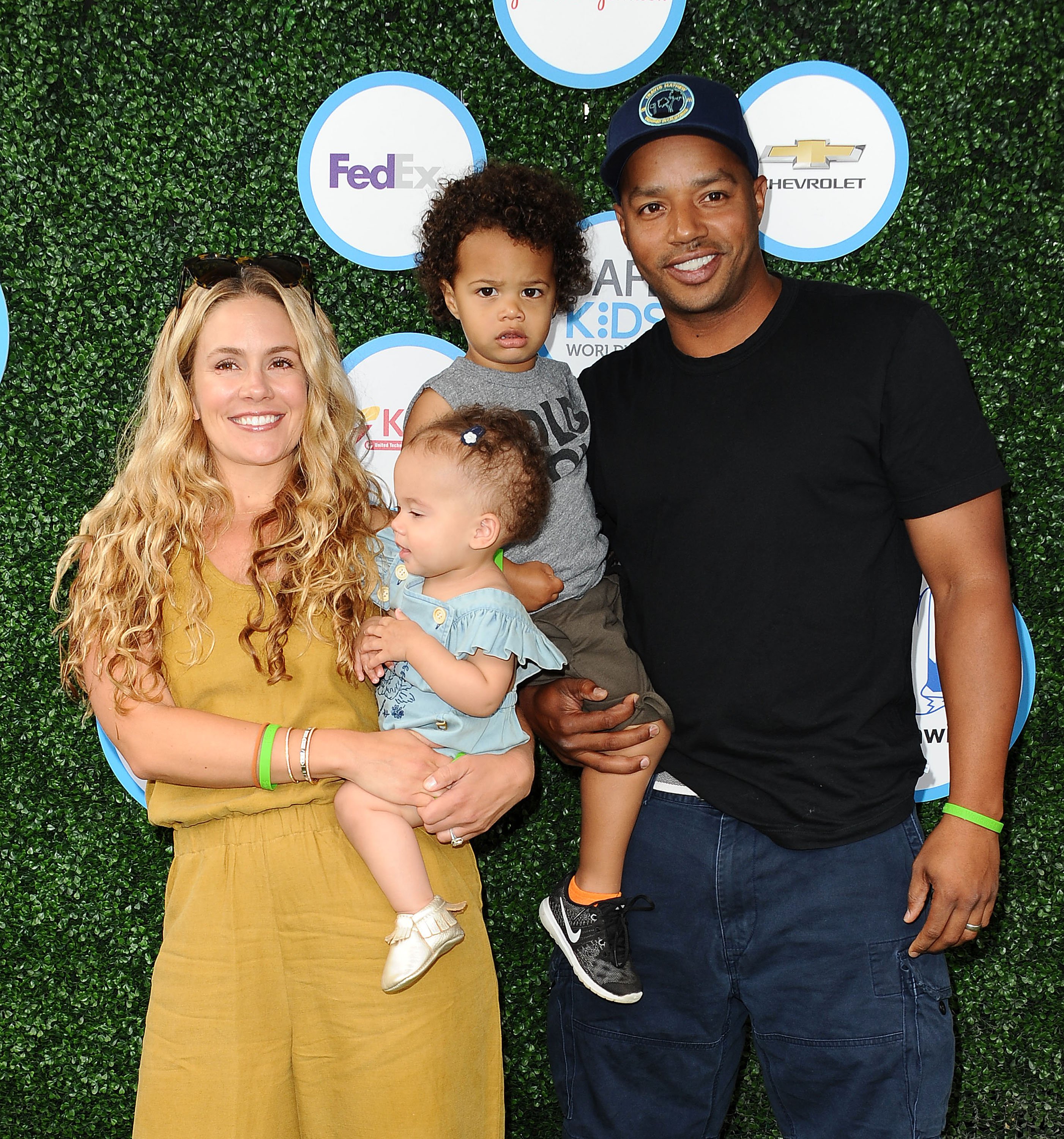 CaCee Cobb, Donald Faison, Wilder Frances Faison and Rocco Faison at Safe Kids Day at Smashbox Studios on April 24, 2016 in Culver City, California | Photo: Getty Images