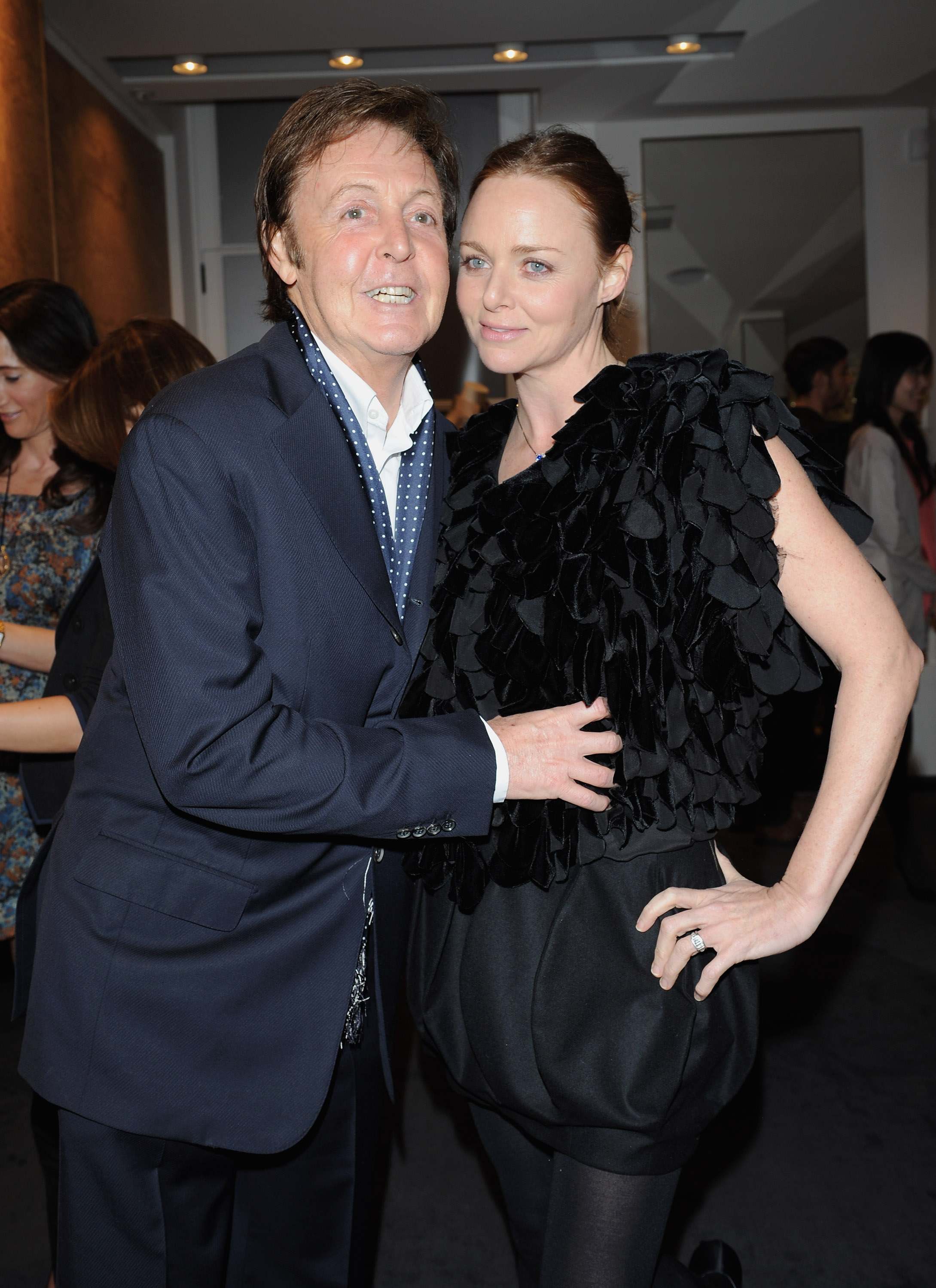 Paul and Stella McCartney at the opening of her Paris store in France, 2009 | Source: Getty Images