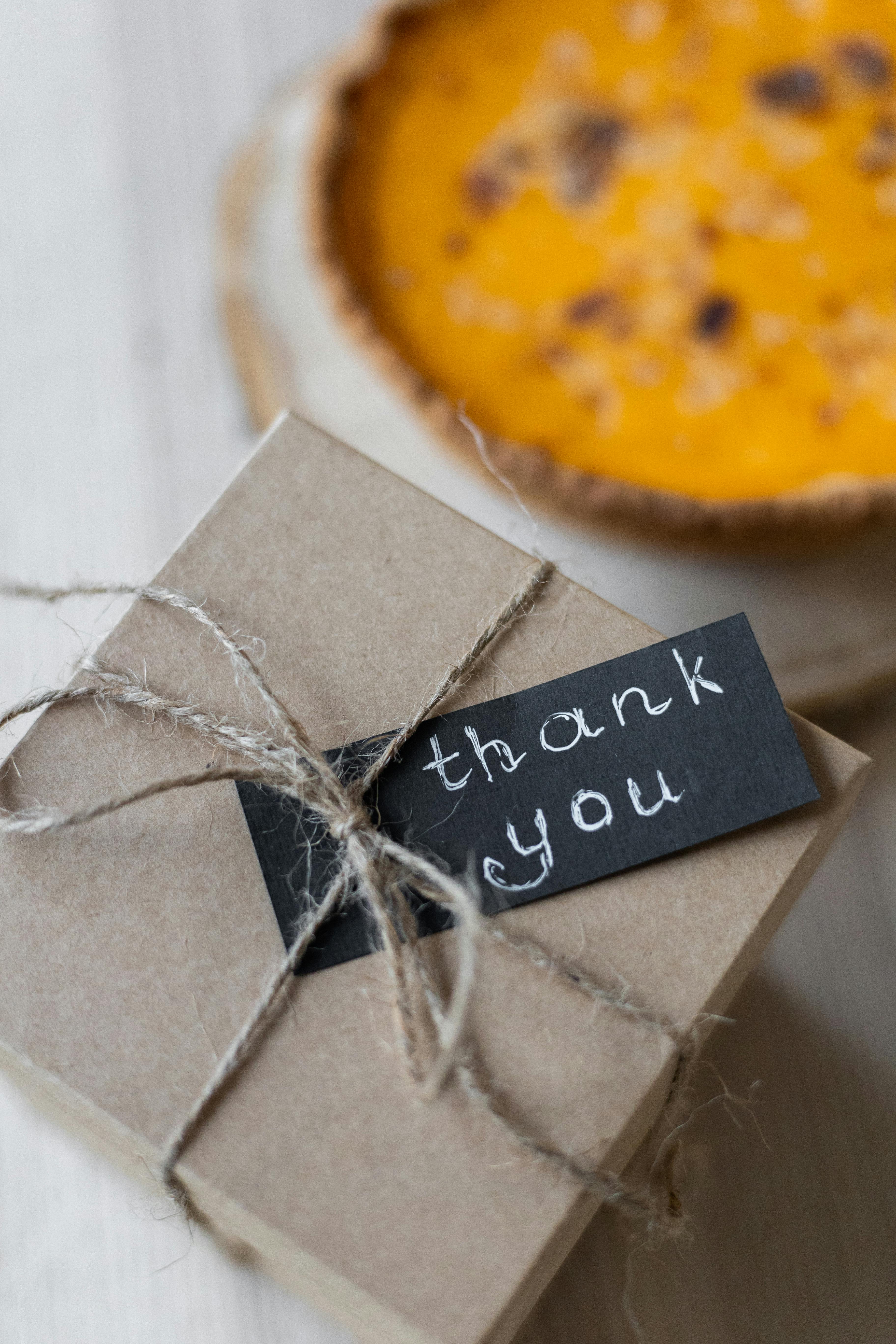 Package with a "Thank you" note | Source: Pexels