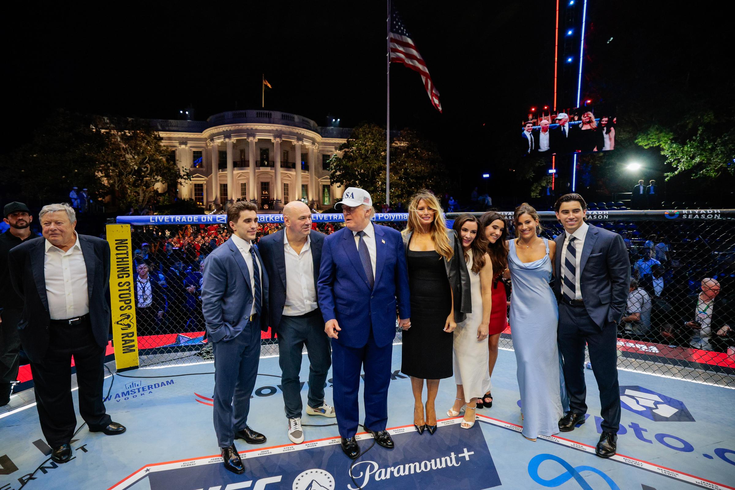 VIP guests join Donald Trump and Dana White inside the Octagon during UFC Freedom 250 at the White House. | Source: Getty Images