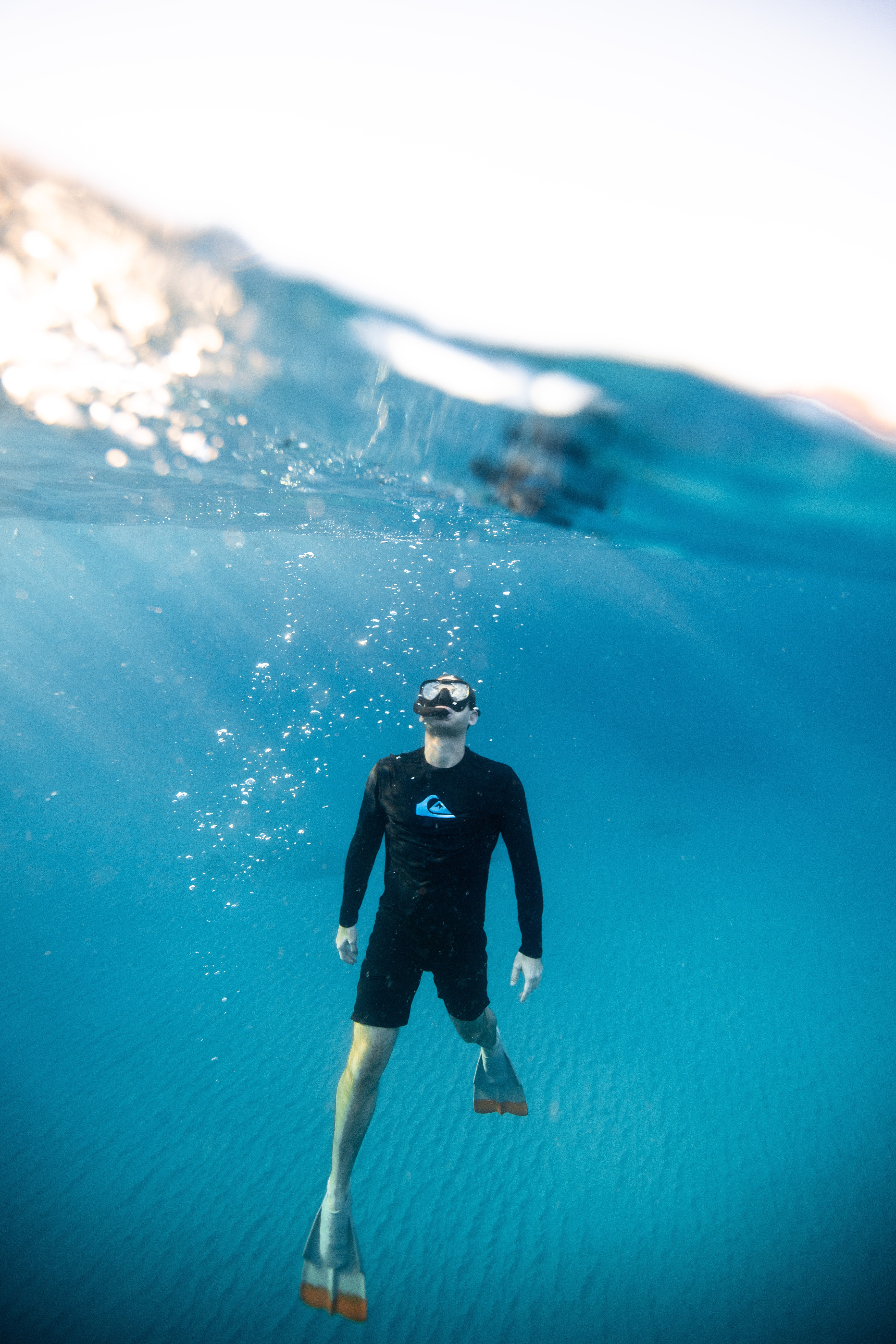 Pictured - A photo of a man swimming underwater in snorkeling gear | Source; Pexels 