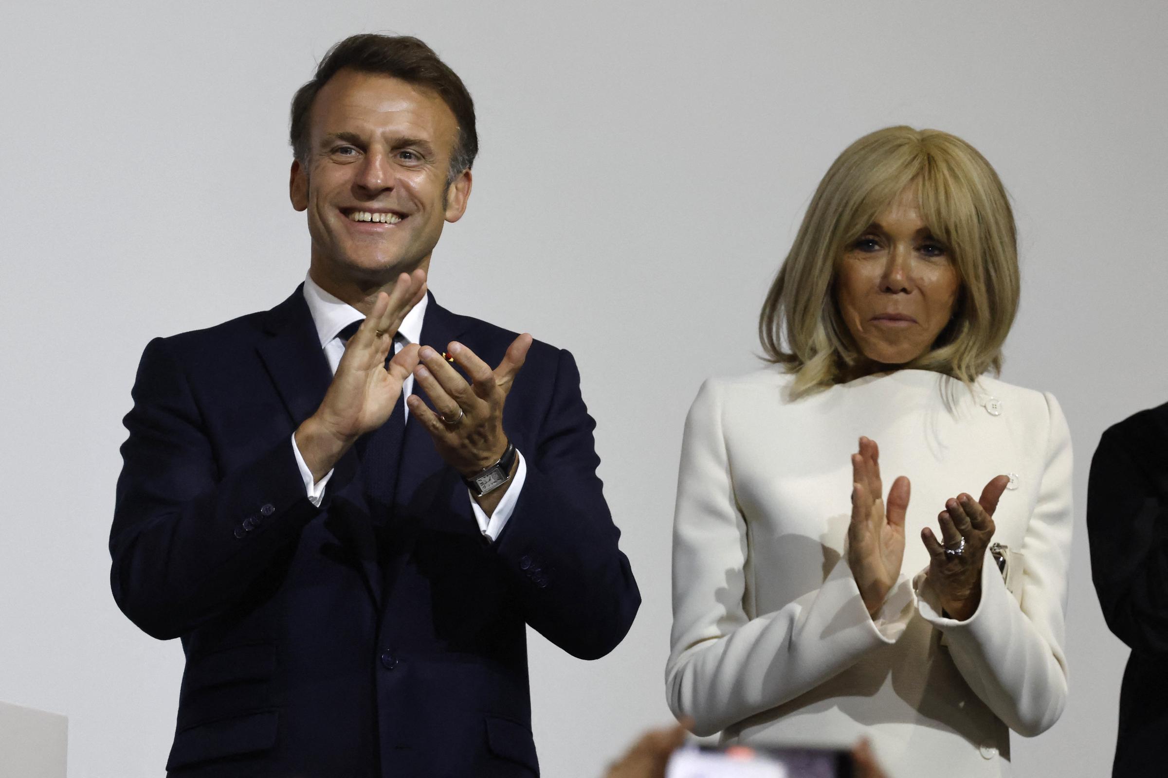 President Emmanuel and Brigitte Macron during a reception for members of the French community at the International French School (IFS) in Singapore on May 30, 2025. | Source: Getty Images