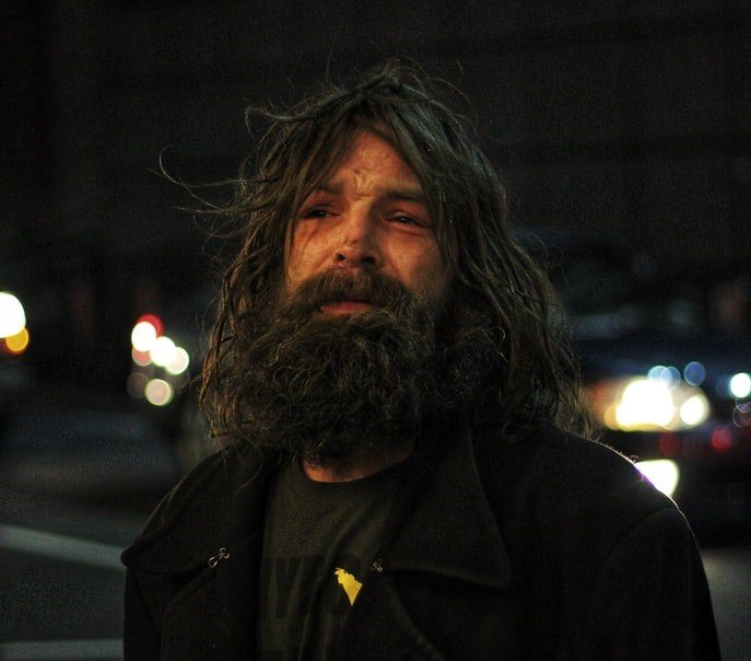 Jane recognized the homeless man by his boots | Source: Unsplash