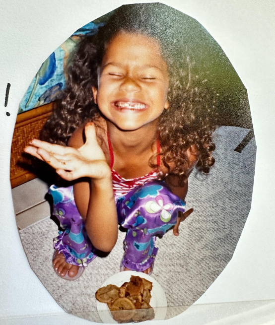 The world was likely unprepared to witness how this young girl would evolve into a multitalented global star. In this photo, she posed as a child while eating and making a goofy face in a throwback image uploaded on September 2, 2023. | Source: Instagram/zendaya