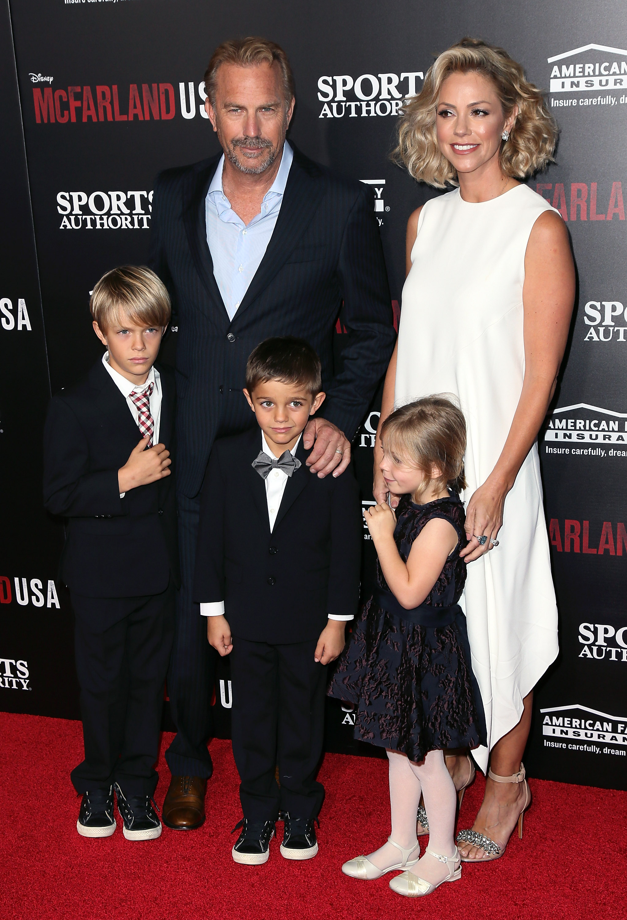 Cayden, Kevin, Hayes, and Grace Costner with Christine Baumgartner at the premiere for "McFarland, USA" in Hollywood, 2015 | Source: Getty Images