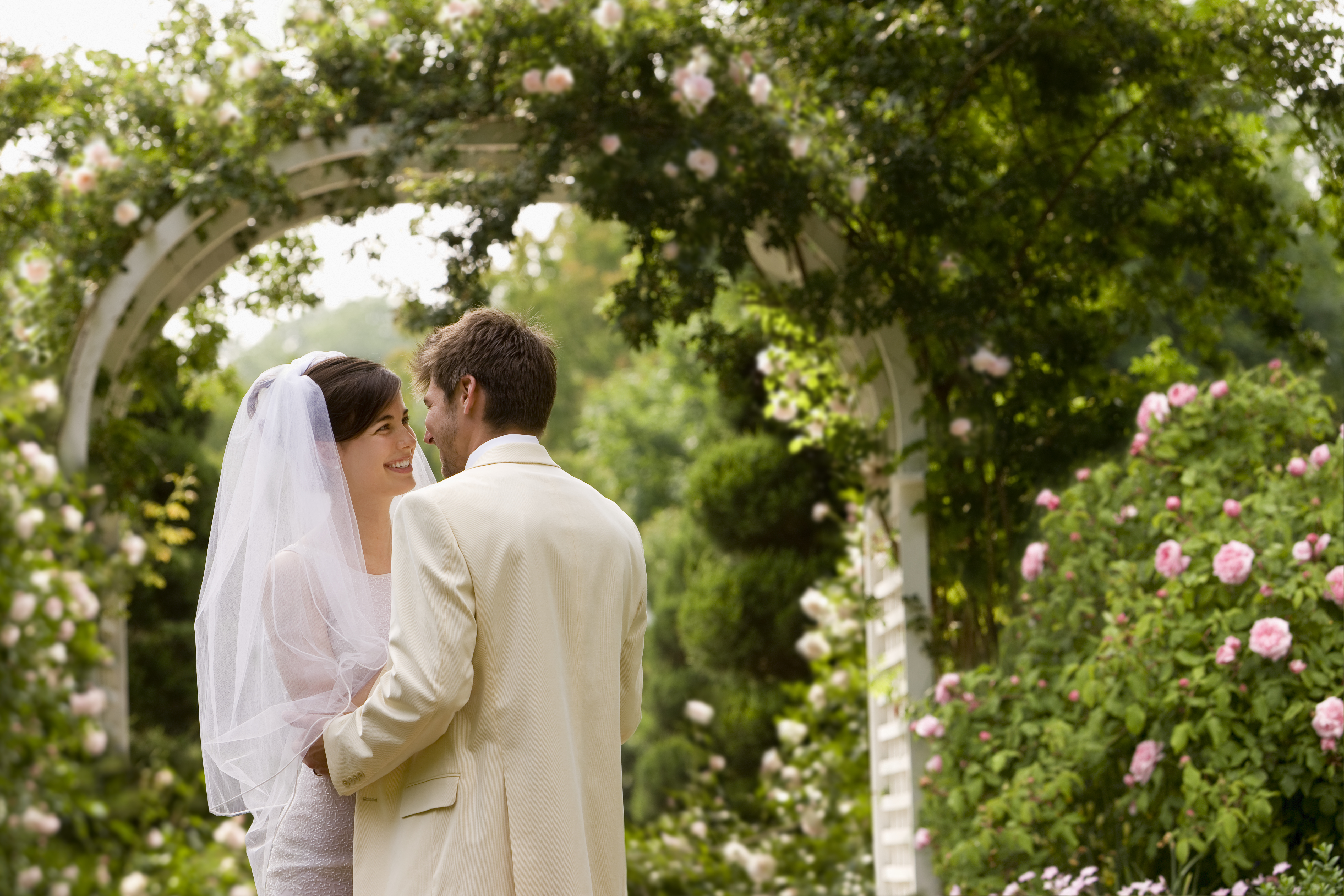 Young Couple Getting Married in Garden | Source: Getty Images