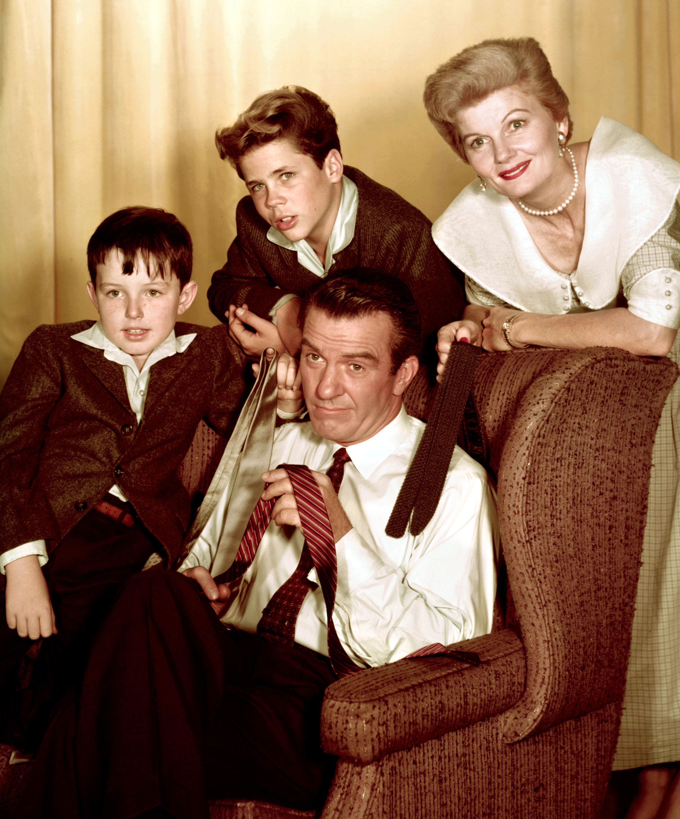 Jerry Mathers, Hugh Beaumont, Tony Dow, and Barbara Billingsley as their characters from "Leave It to Beaver" in Los Angeles, 1957 | Source: Getty Images