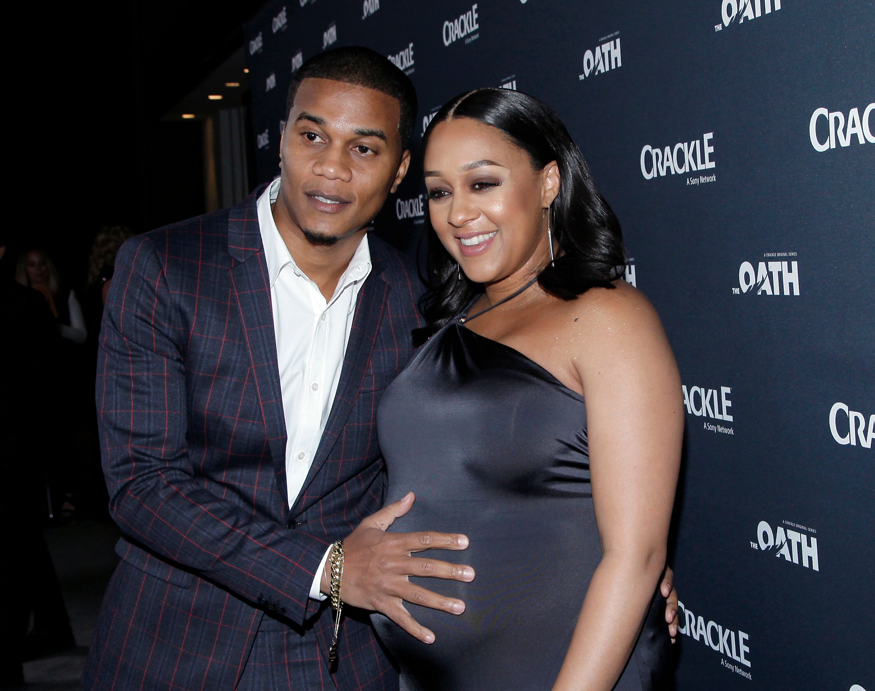 Cory Hardrict and Tia Mowry attending a premiere while pregnant with daughter Cairo | Source: Getty Images/GlobalImagesUkraine
