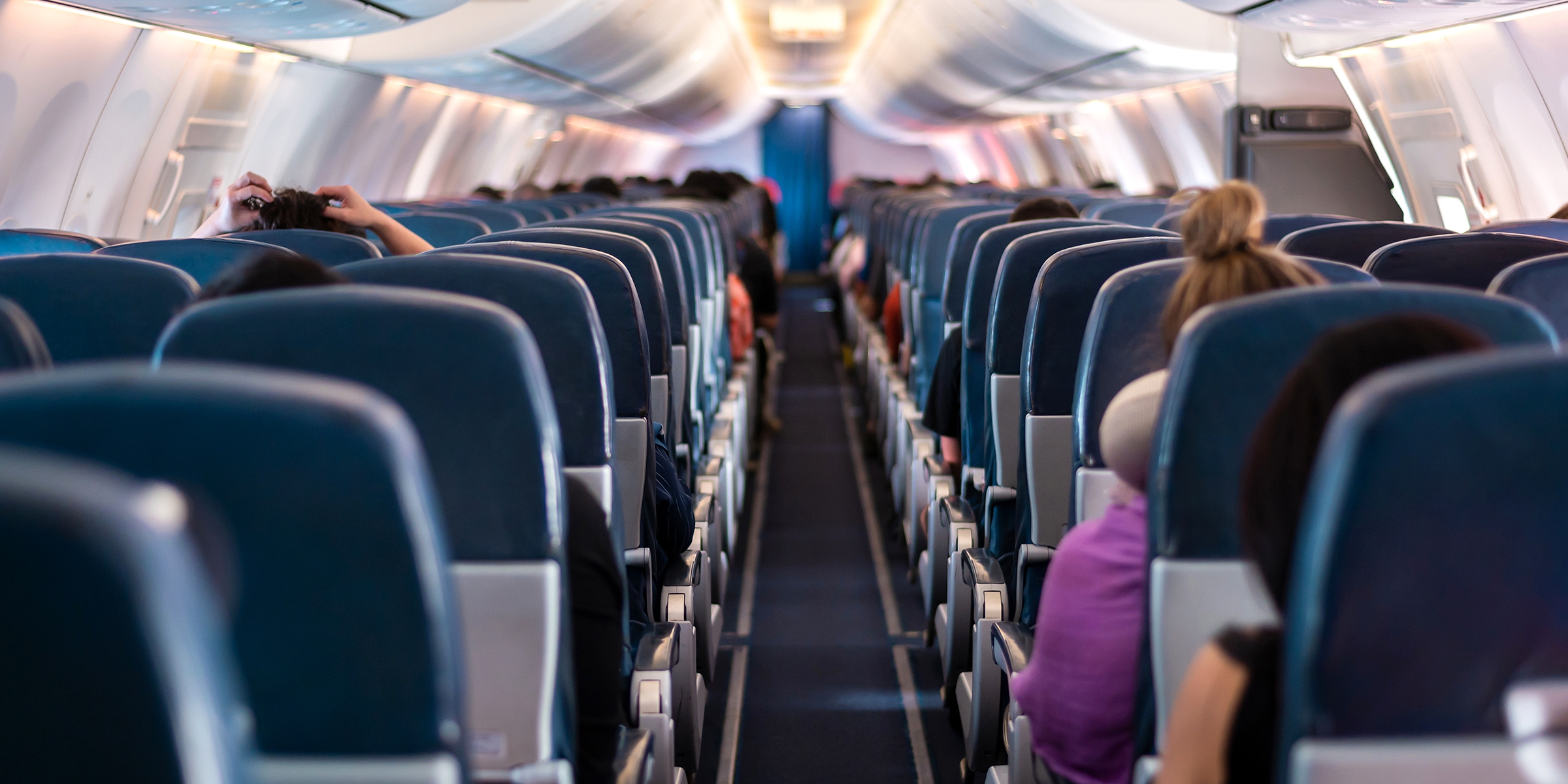 Passengers in a plane | Source: Midjourney