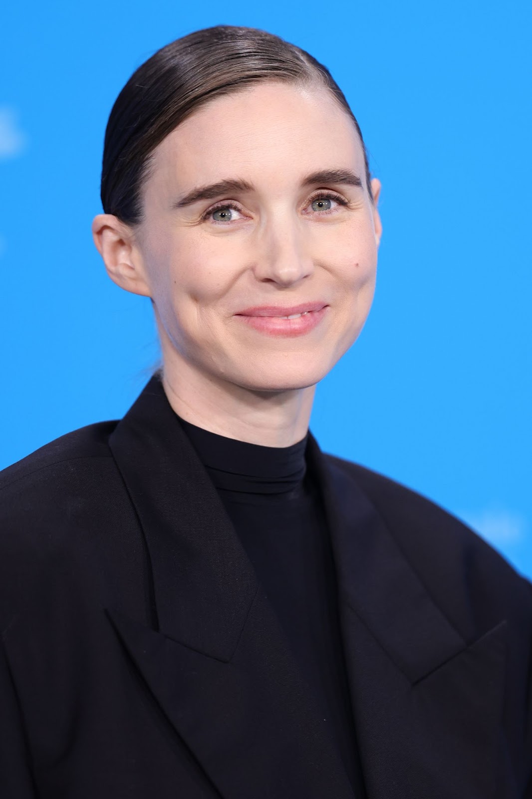 Rooney Mara attended the 74th Berlinale International Film Festival in 2024 in Berlin, Germany, where she proudly displayed her baby bump, bringing elegance and anticipation to the international event. | Source: Getty Images