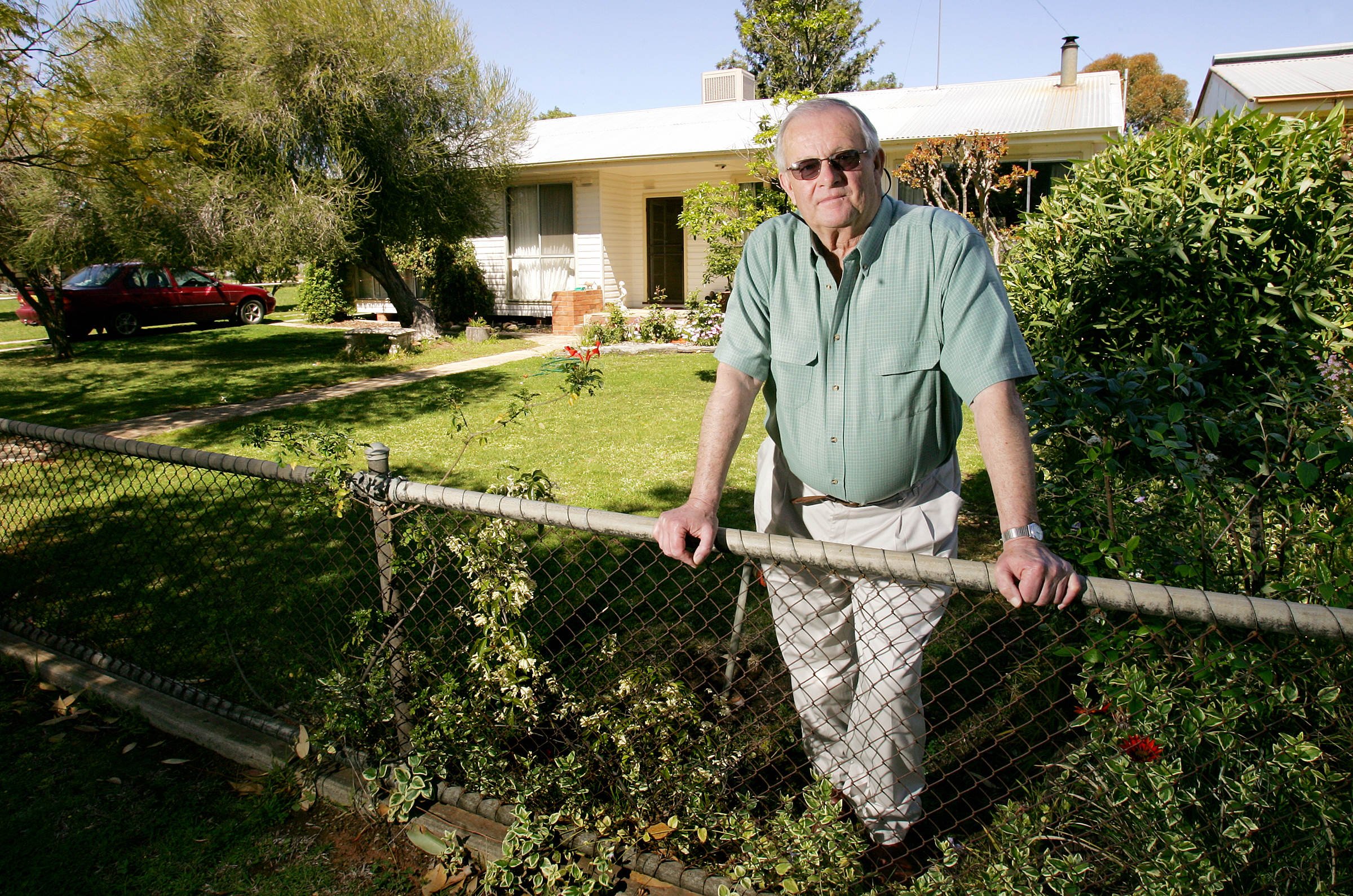 Michael Hastings photographed in front of his modest house situated in a small town called Jerilderie on 02 October 2005 in Australia. / Source: Getty Images