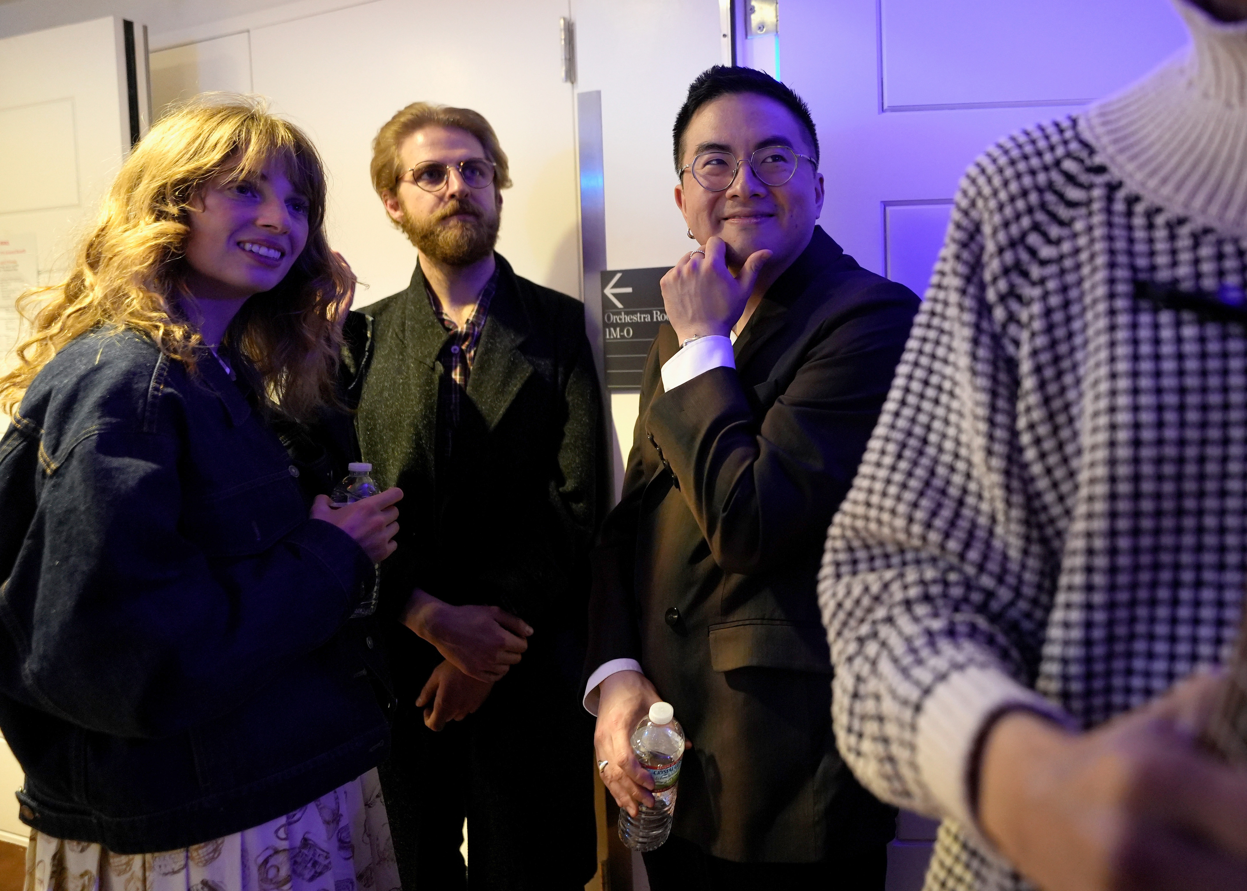 Maya Hawke, Christian Lee Hutson, and Bowen Yang are seen backstage during the 37th Annual Tibet House US Benefit Concert at Carnegie Hall on February 26, 2024 in New York City. | Source: Getty Images