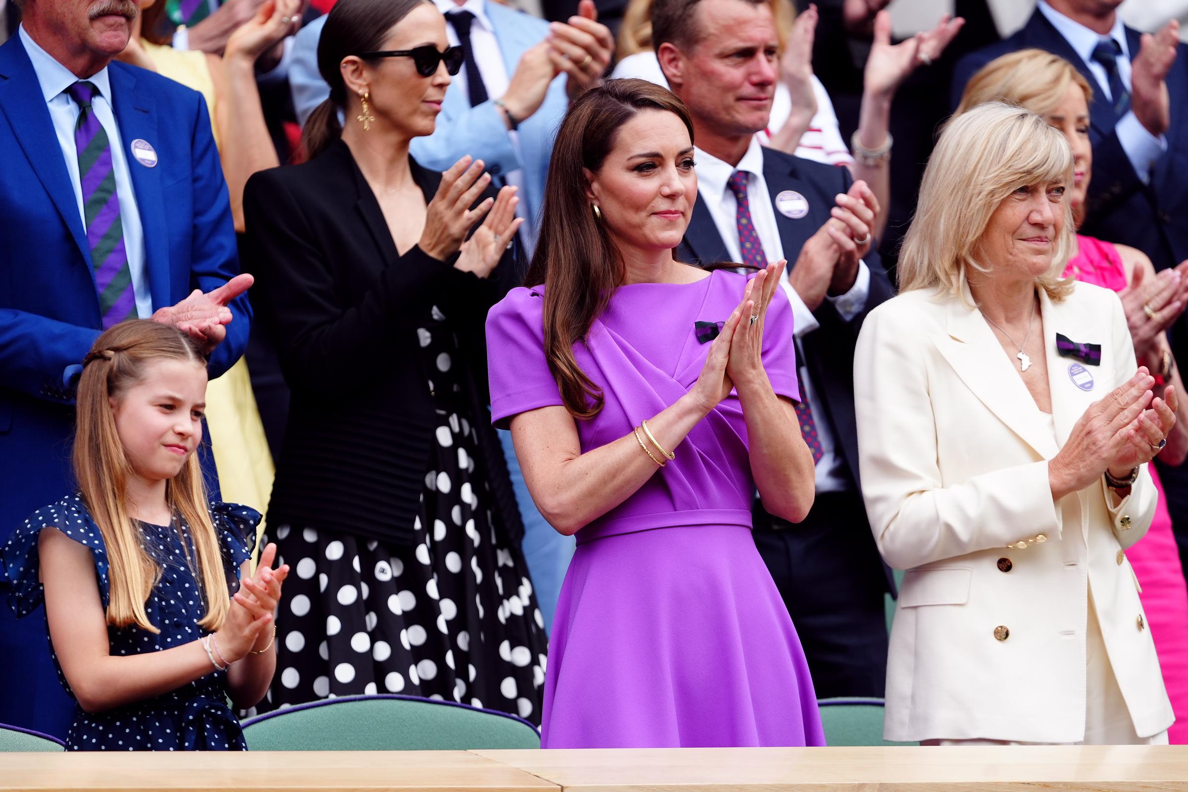 Princess Charlotte, Kate Middleton and Deborah Jevans photographed in the royal box at the Wimbledon Championships on July 14, 2024, in London, England. | Source: Getty Images