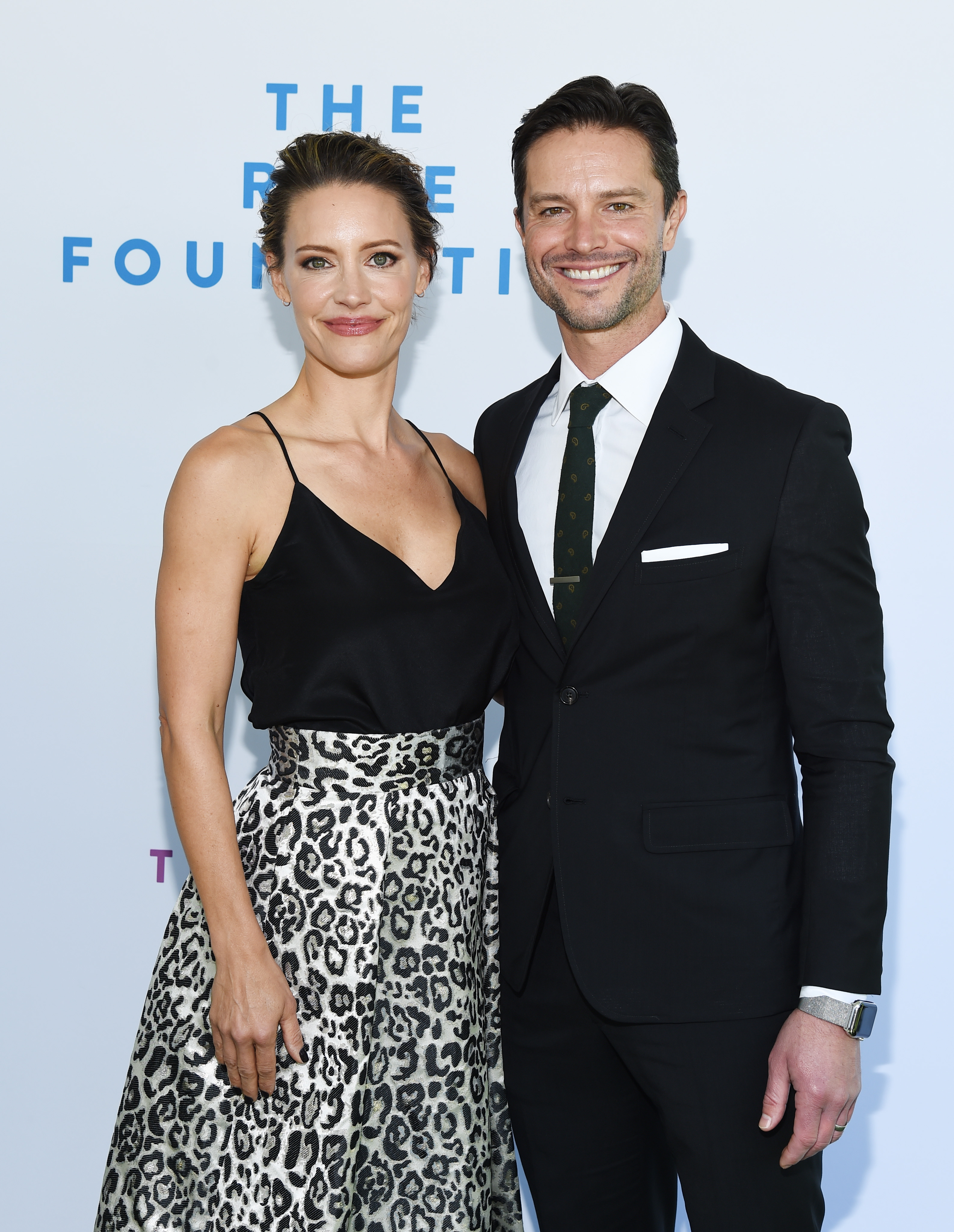 KaDee Strickland and Jason Behr pose as they arrive at The Rape Foundation's 2019 Annual Brunch Benefiting Rape Treatment Center and Stuart House at Santa Monica-UCLA Medical Center on October 6, 2019, in Beverly Hills, California | Source: Getty IMages