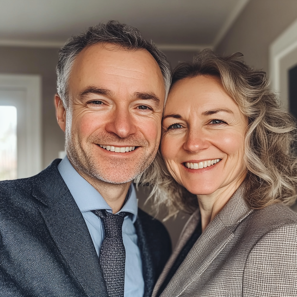 A smiling couple in their forties | Source: Midjourney