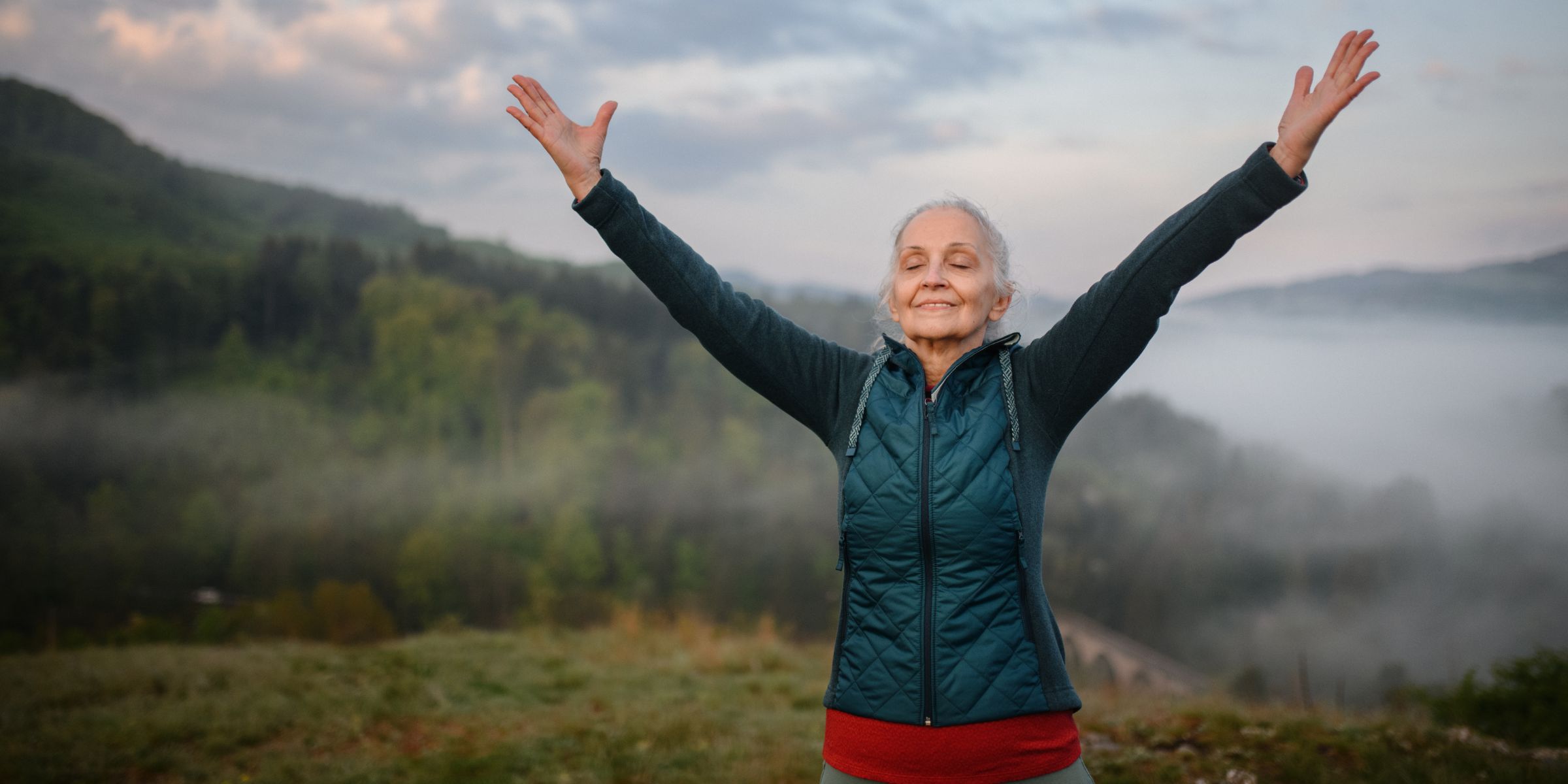 Woman enjoying an outdoor moment | Source: Shutterstock