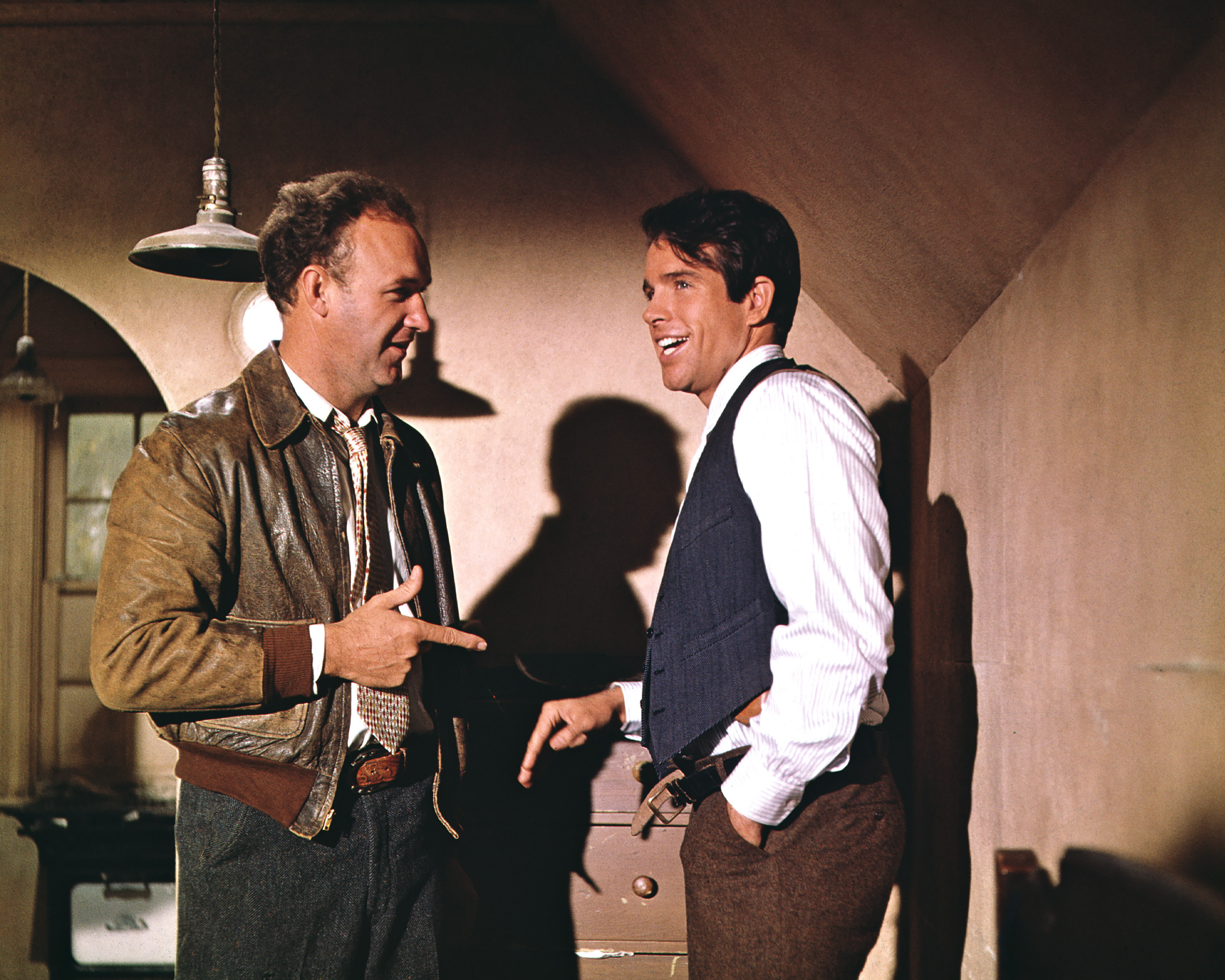 Warren Beatty as Clyde Barrow and Gene Hackman as Buck Barrow in the film "Bonnie and Clyde" in 1967 | Source: Getty Images