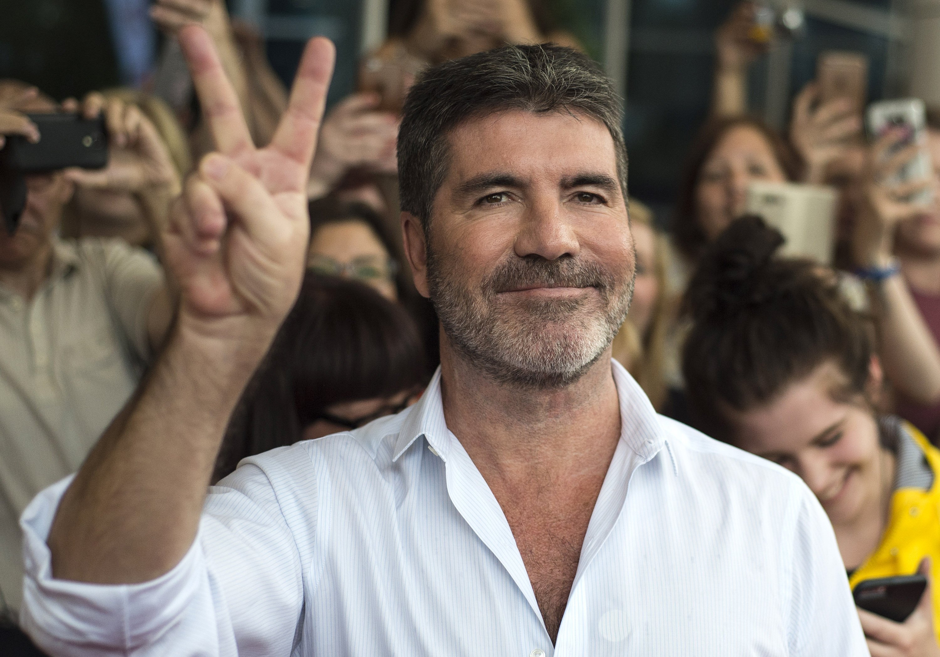 Simon Cowell arrives for X Factor auditions in Leicester, UK on June 10, 2016 | Photo: Getty Images