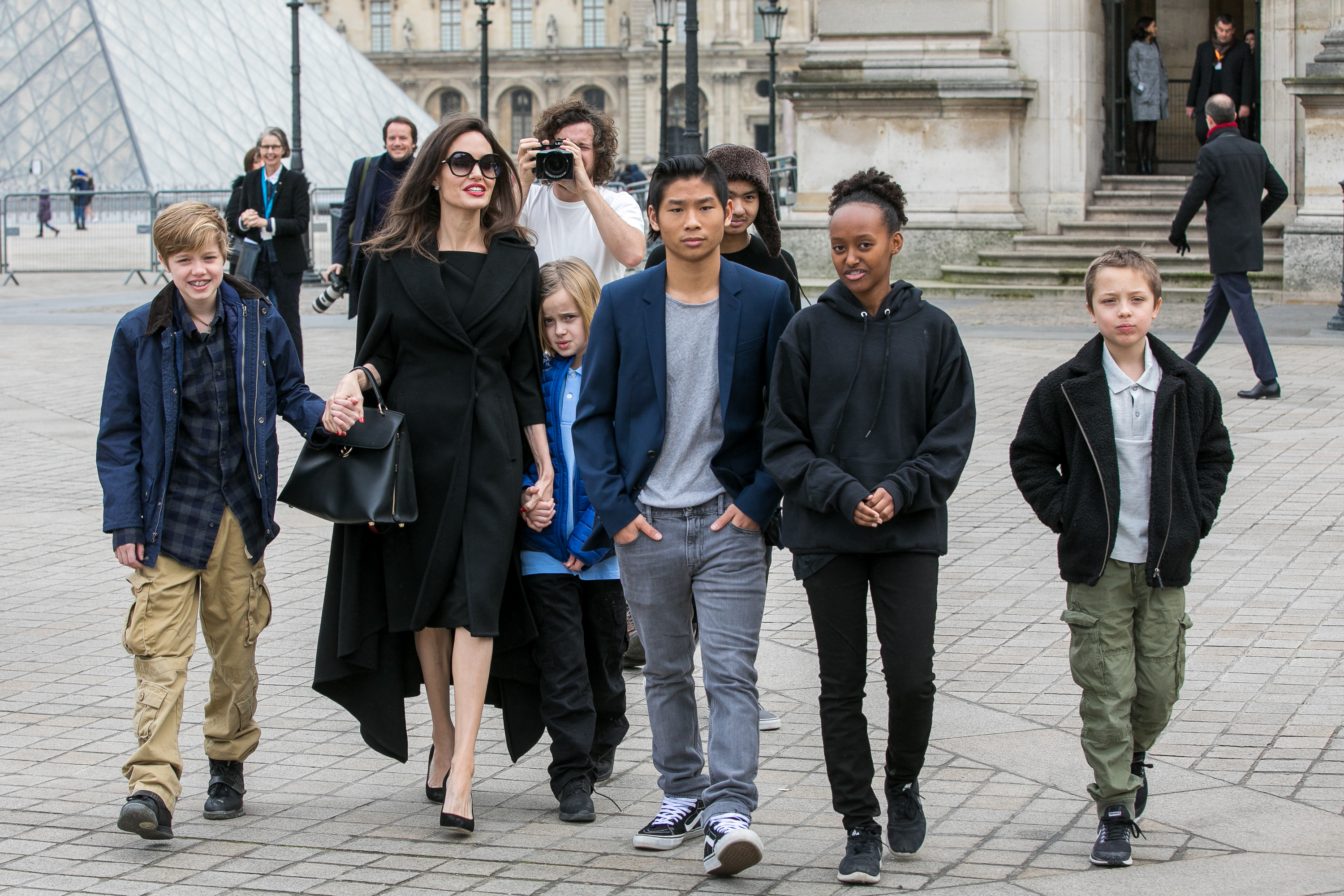 Actress Angelina Jolie and her children Maddox, Shiloh, Vivienne Marcheline, Knox Leon, Zahara and Pax Jolie-Pitt on January 30, 2018 in Paris, France | Source: Getty Images