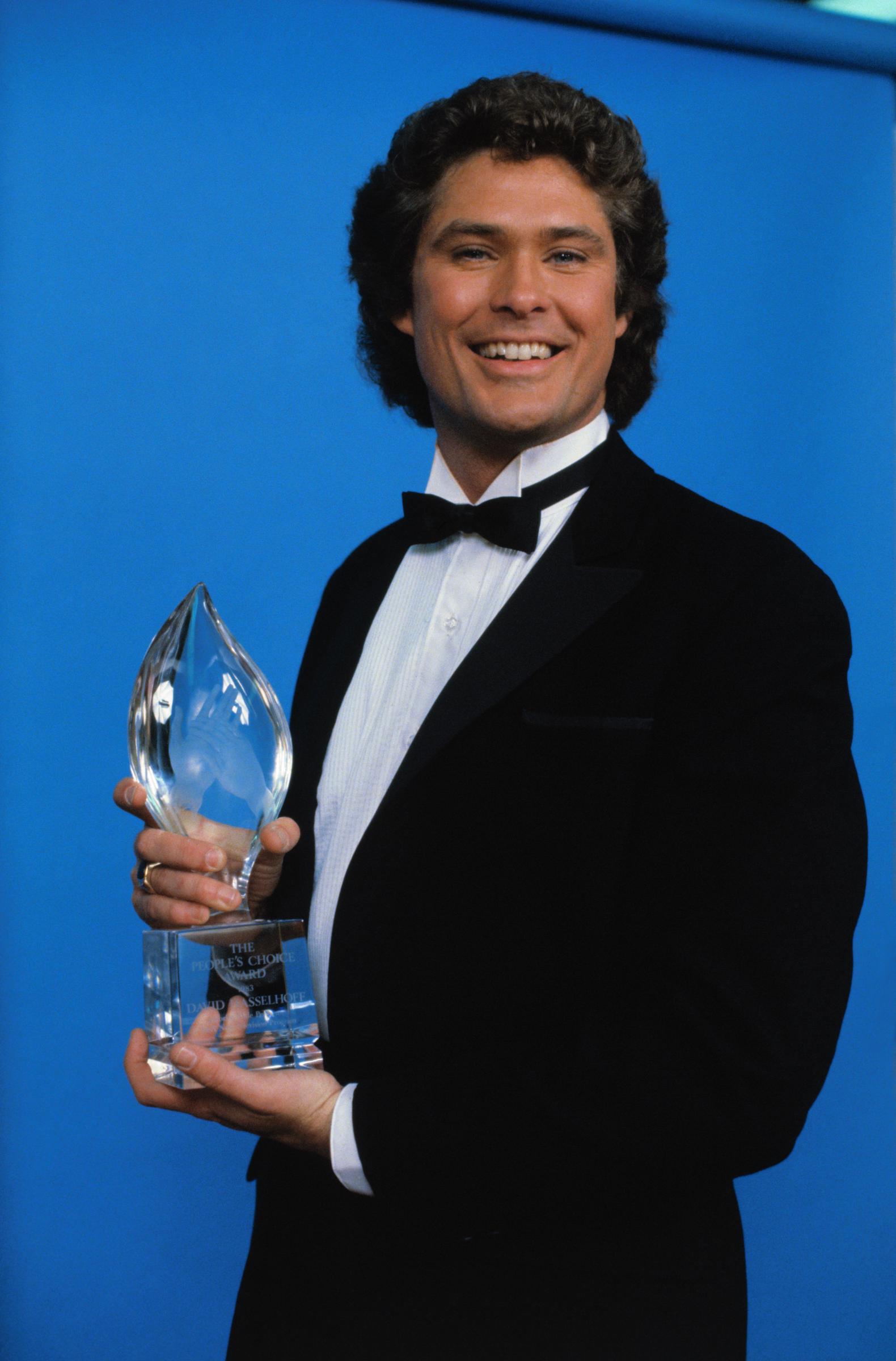 David Hasselhoff poses with his People's Choice Award for Favorite Actor in a New TV Program on March 1, 1983.