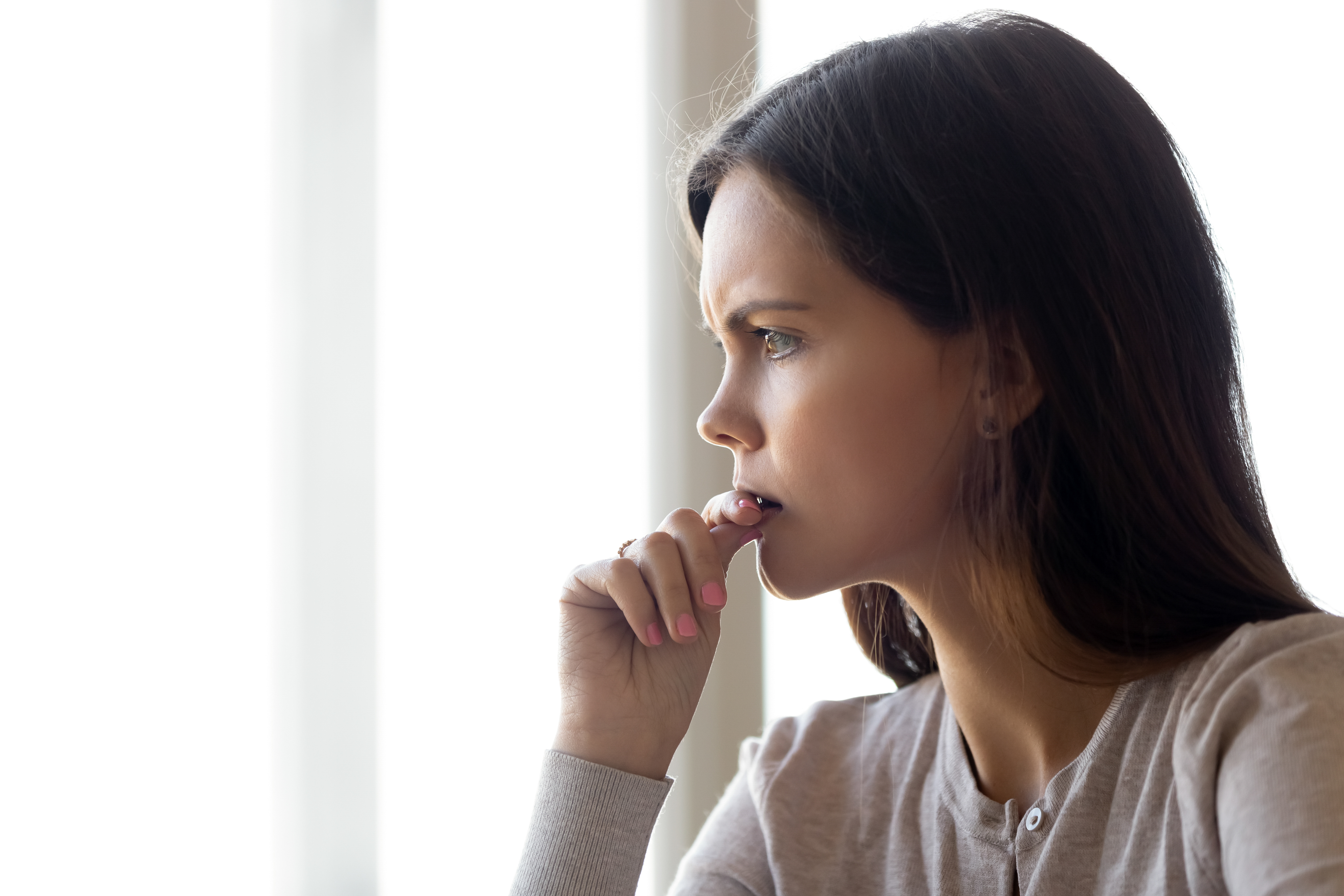 A woman lost in deep thoughts | Source: Shutterstock