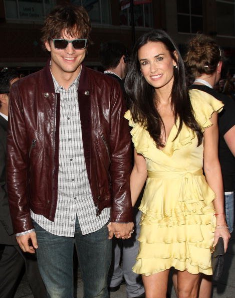 Ashton Kutcher (L) and wife actress Demi Moore arrive at the "The Joneses" screening during the 2009 Toronto International Film Festival held at the Visa Screening Room at the Elgin Theatre on September 13, 2009, in Toronto, Canada. | Source: Getty Images.