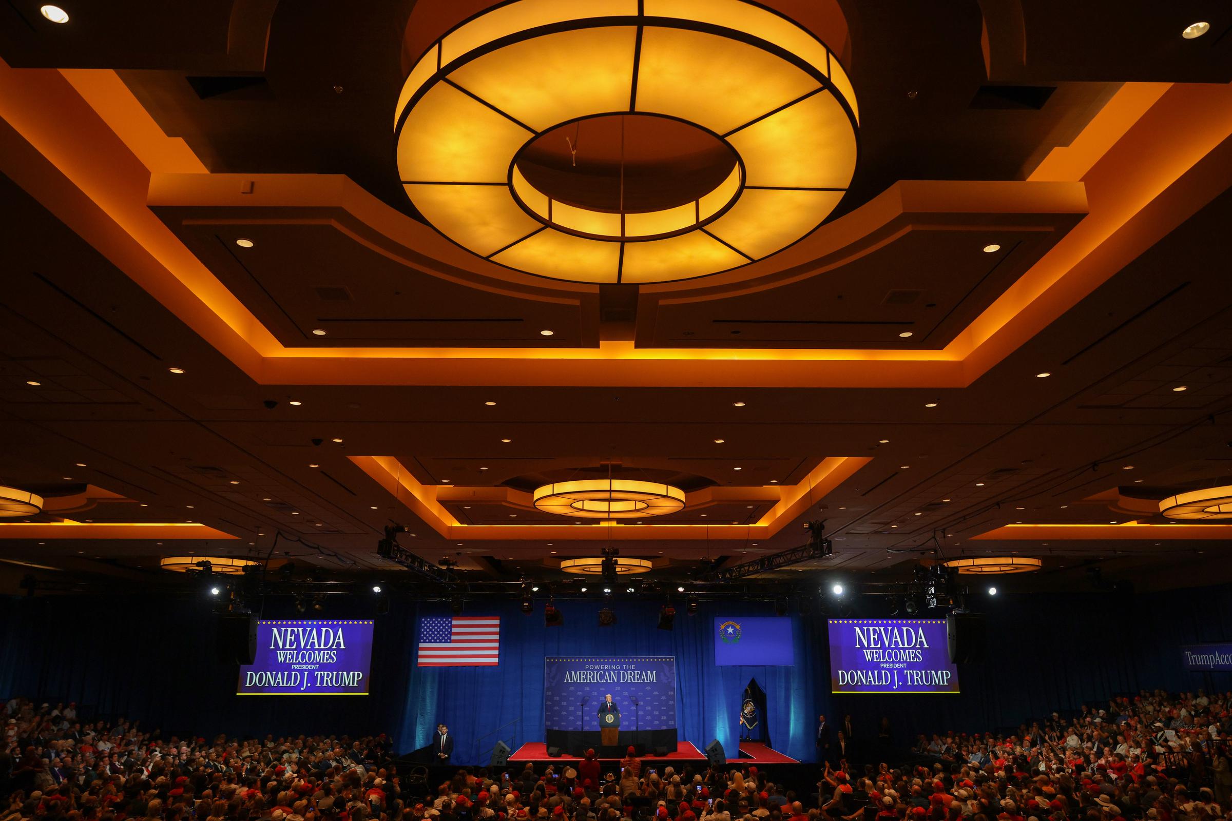 A wide view of the Red Rock Casino Resort and Spa showed the scale of the Las Vegas event, with a large crowd gathered around the stage. The setting underscored the turnout before Trump began his remarks. | Source: Getty Images