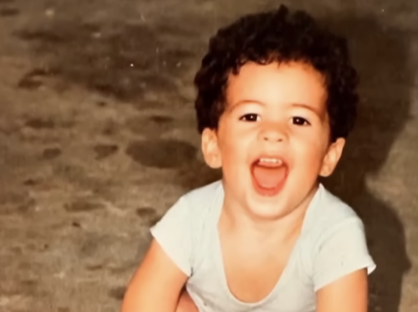 A young Bad Bunny is photographed mid-shout, from a post dated August 31, 2025. | Source: YouTube/TODAY