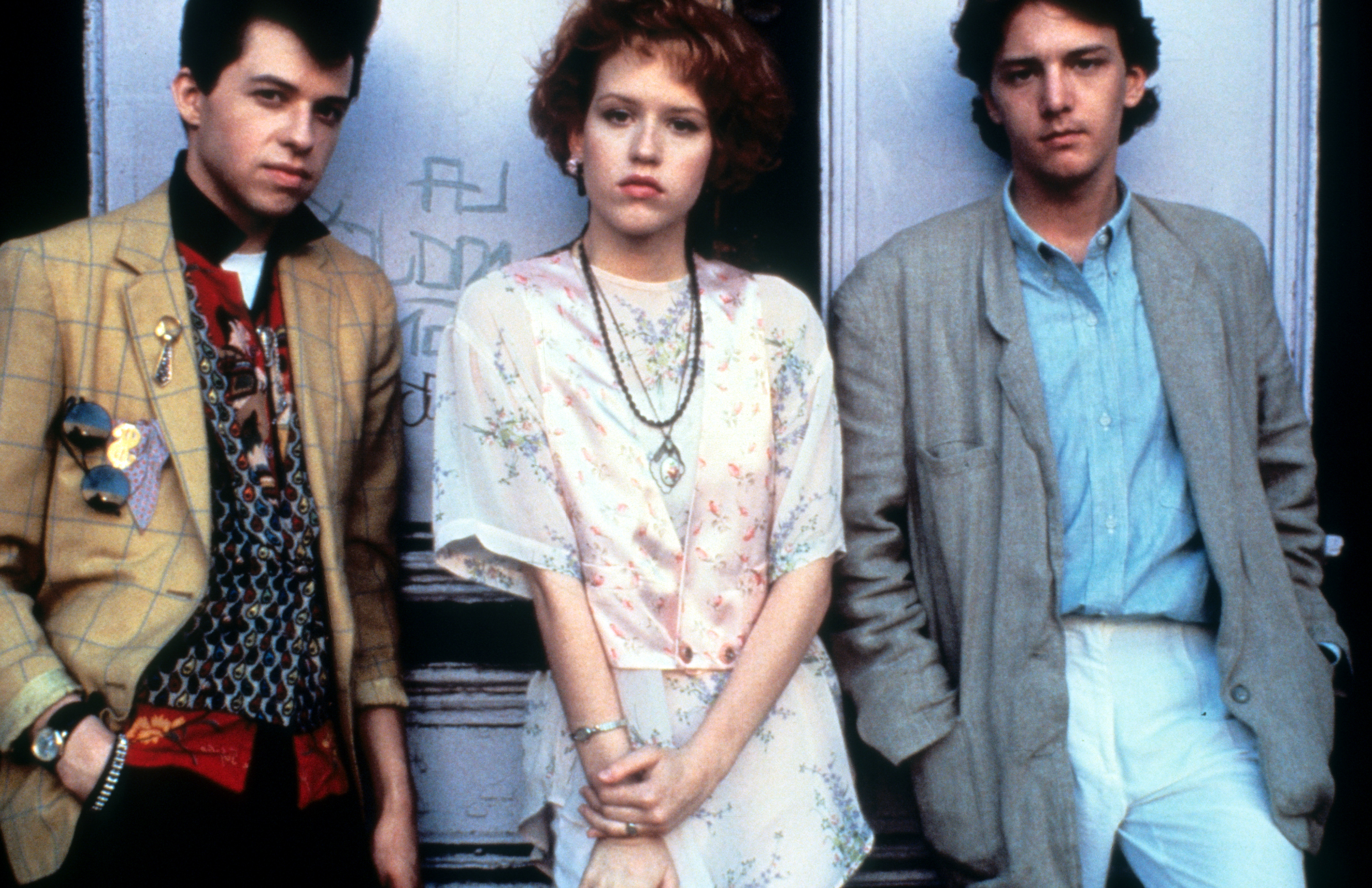 Jon Cryer, Molly Ringwald, and Andrew McCarthy on the set of "Pretty in Pink" in 1986. | Source: Getty Images