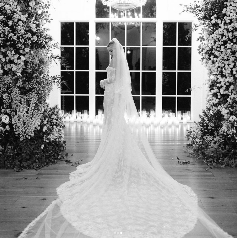 Hailey Bieber posing in her wedding gown. | Source: Instagram/haileybieber