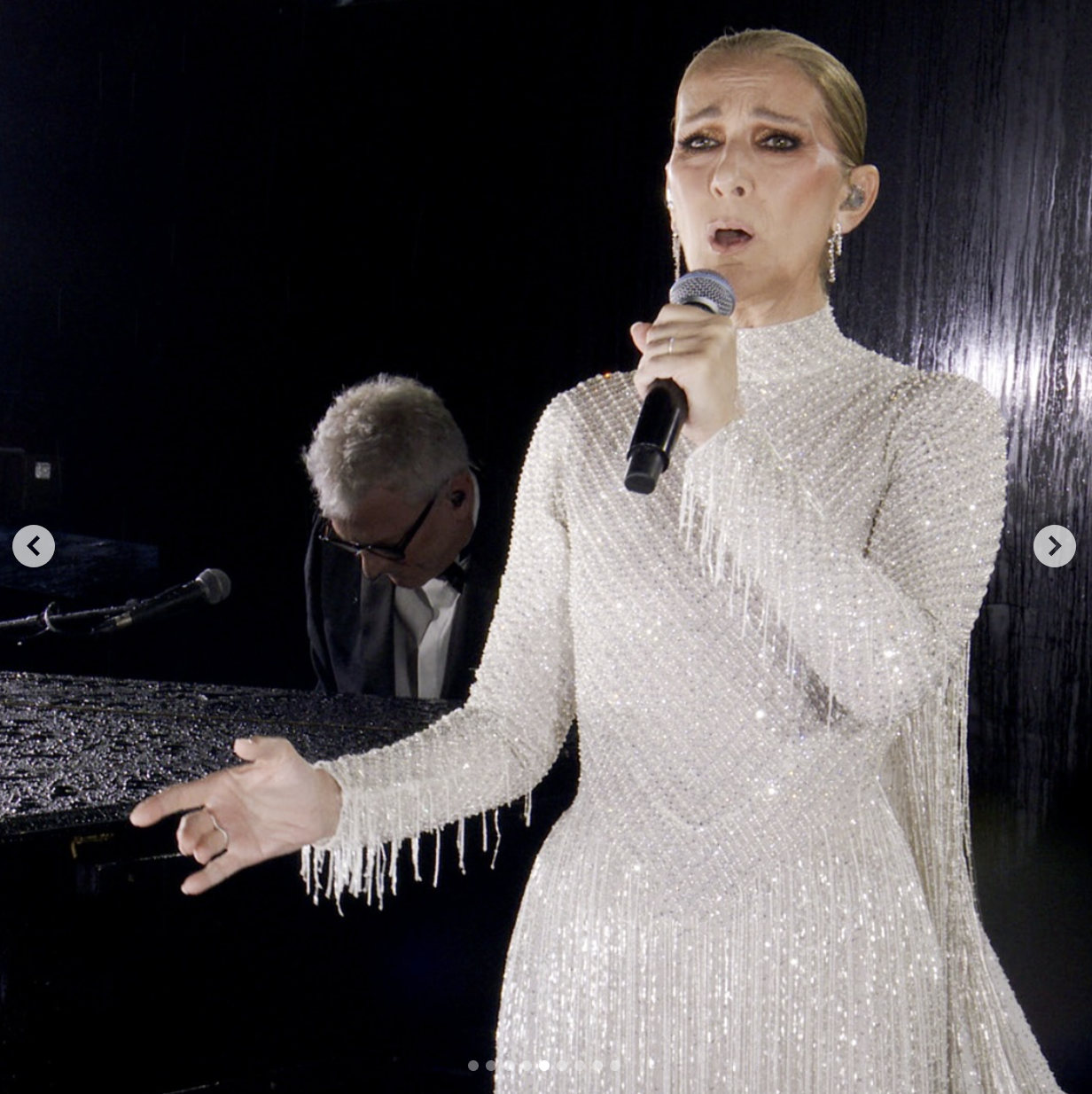 Celine Dion performing on the Eiffel Tower at the opening ceremony of the Paris Olympics 2024, as seen in a post dated July 27, 2024 | Source: Instagram/celinedion