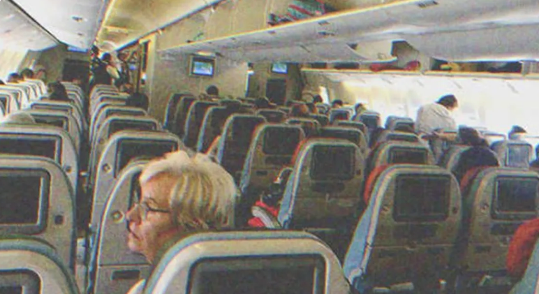 The inside of a plane full of passengers | Source: Shutterstock
