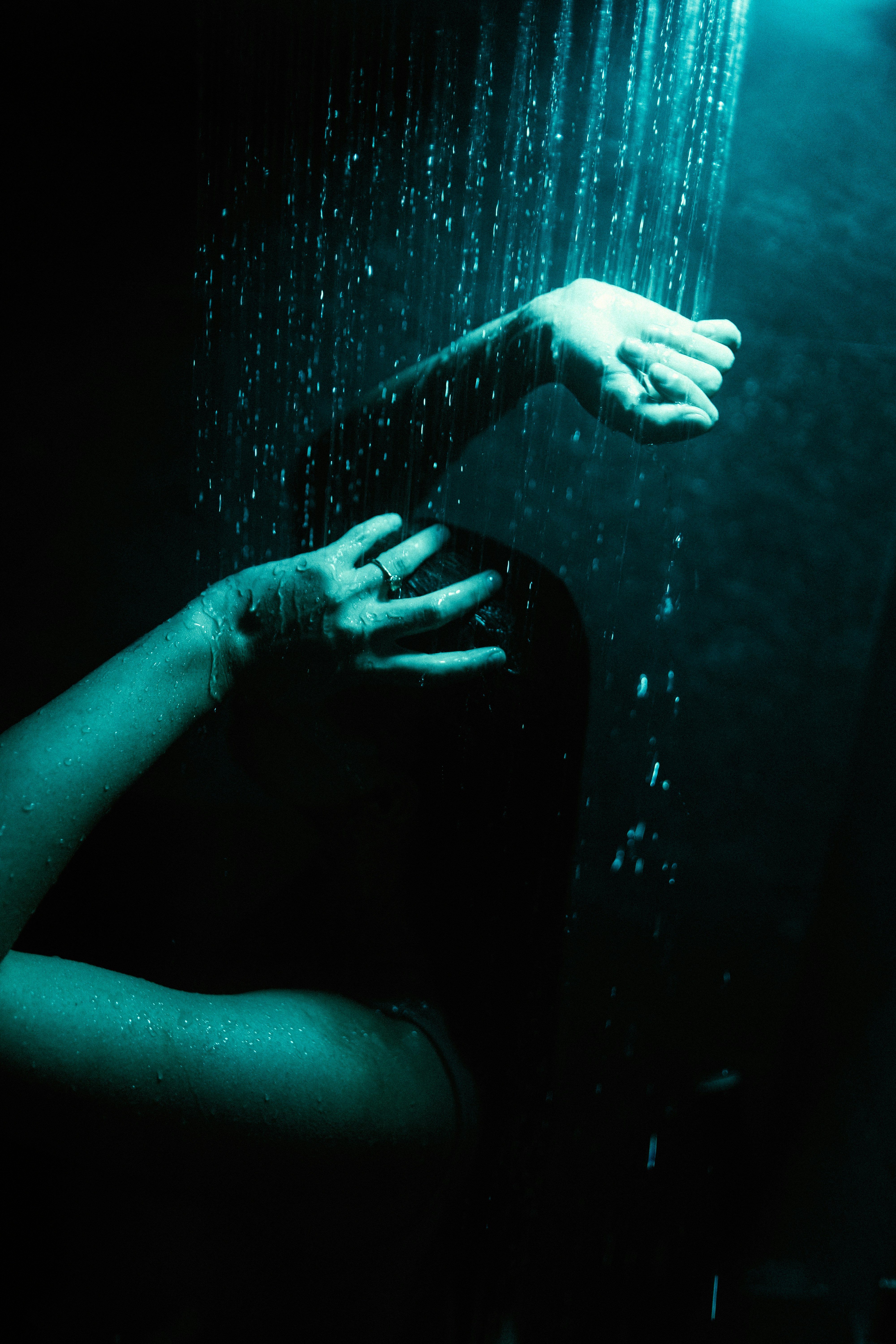 A woman taking a shower | Source: Unsplash