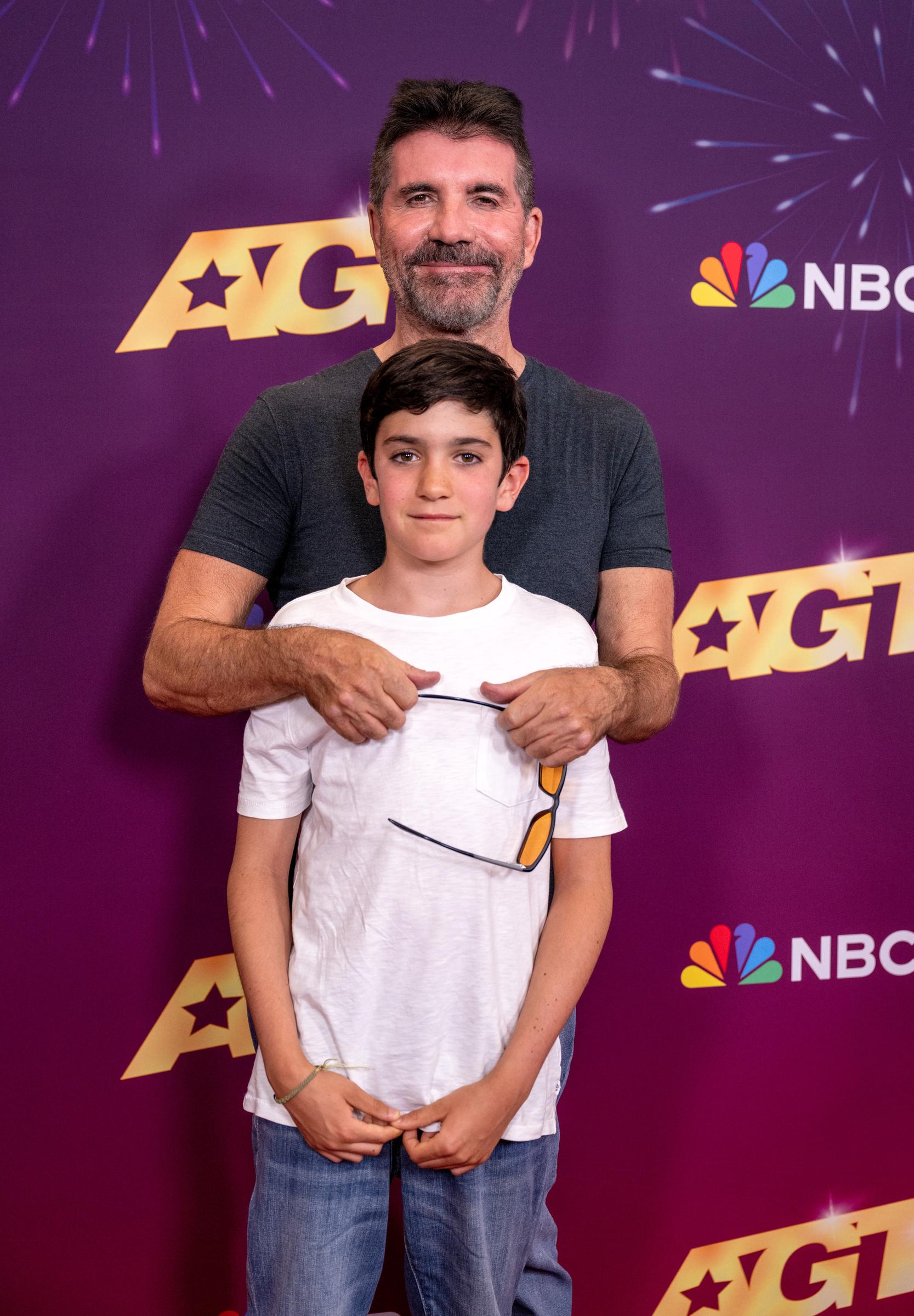 Simon and Eric Cowell at the "America's Got Talent" season 19 quarterfinals red carpet on September 3, 2024, in Pasadena, California. | Source: Getty Images