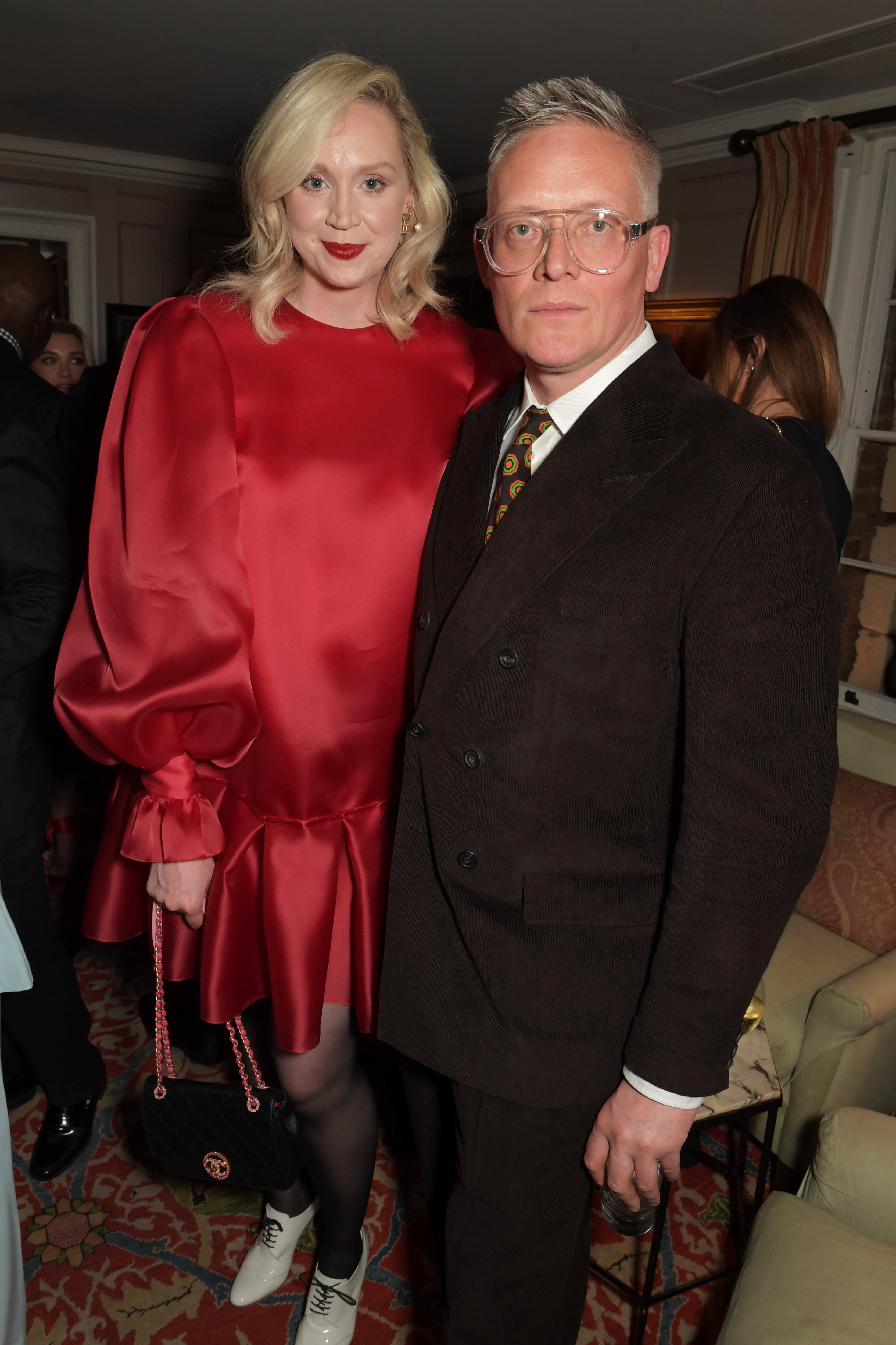 Gwendoline Christie and Giles Deacon at the Charles Finch & CHANEL Pre-BAFTA Party in London | Source: Getty Images