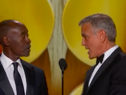 George Clooney interacting with Don Cheadle onstage during their presenter skit at this year's Golden Globe Awards, posted on January 11, 2026. | Source: Instagram/enews