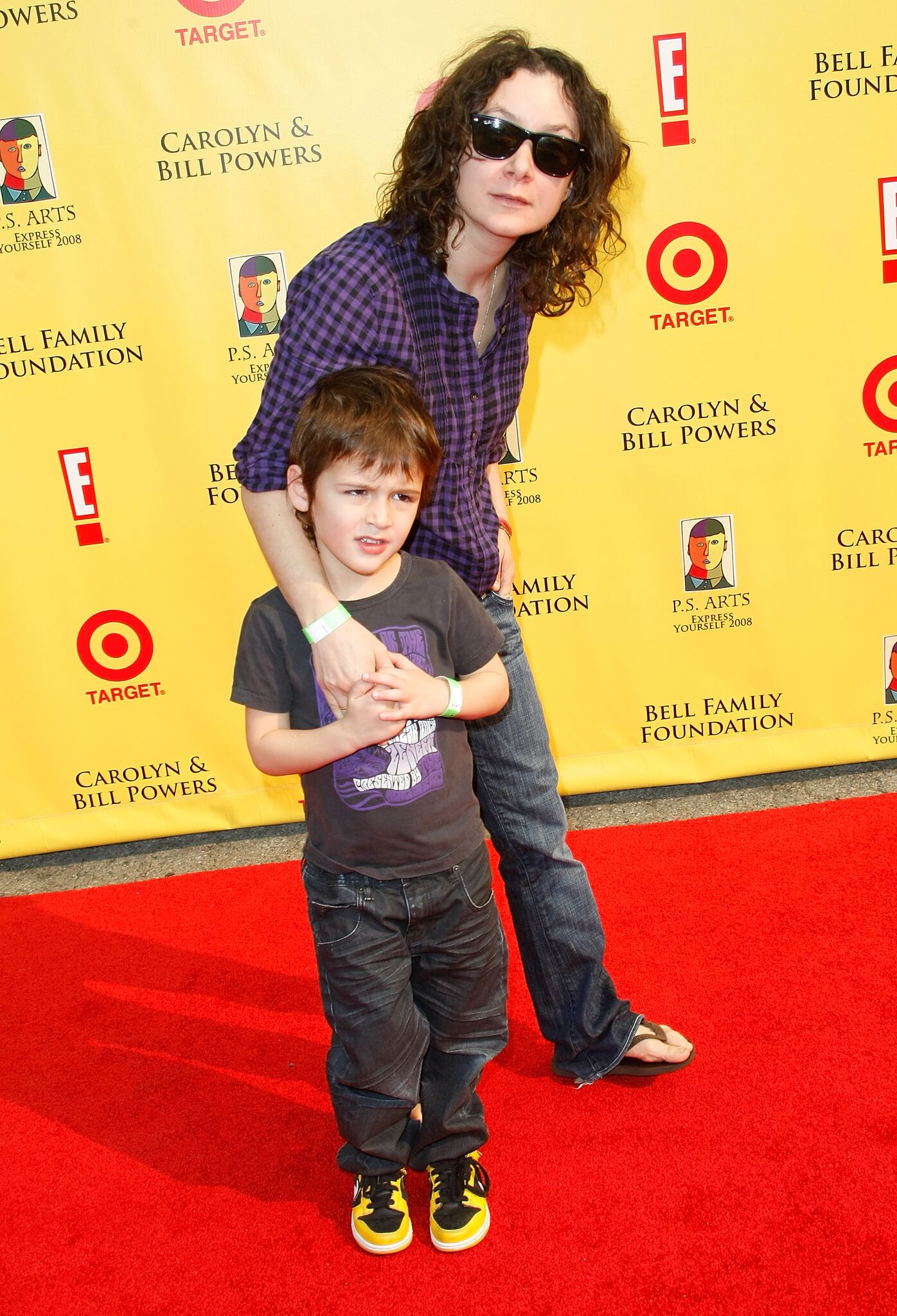 Sara Gilbert and son Levi Hank Gilbert-Adler arrives at the P.S. Arts "Express Yourself 2008" at Barker Hanger | Getty Images