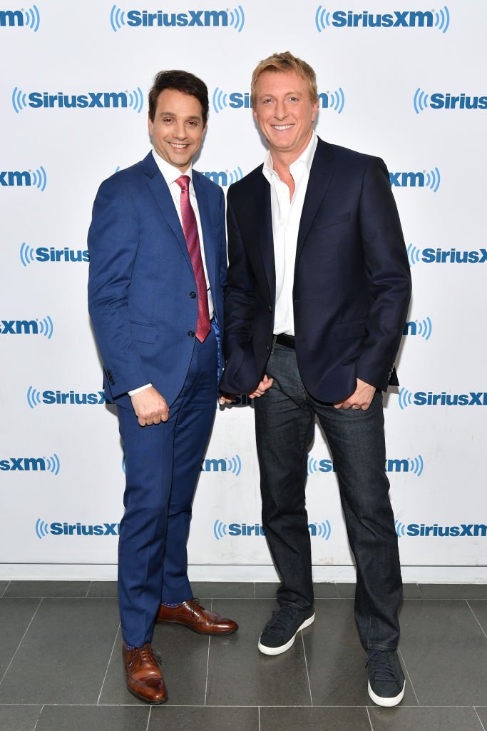 Ralph Macchio (L) and William Zabka visit SiriusXM Studios on May 1, 2018 in New York City. | Source: Getty Images
